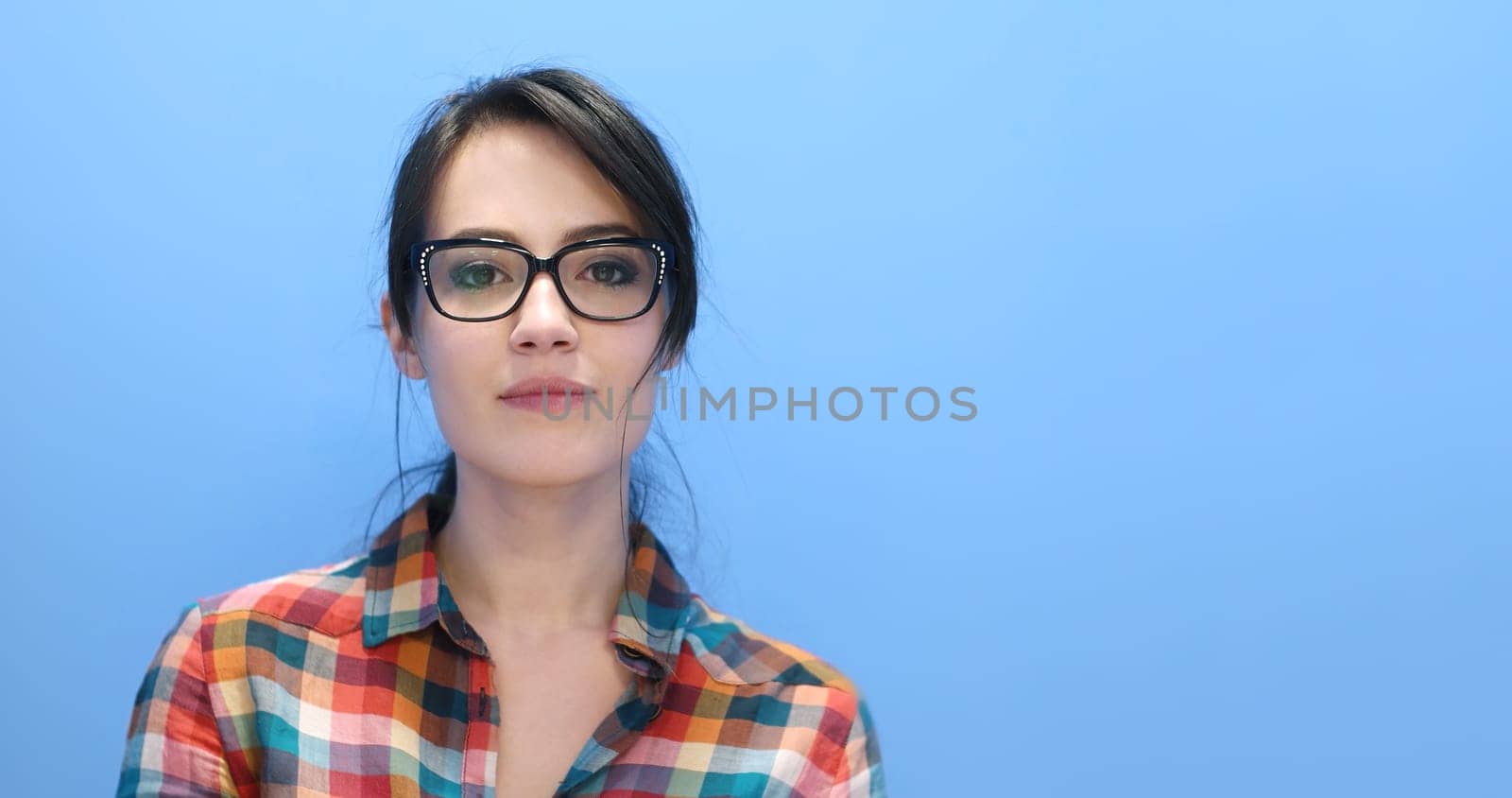 Attractive Young Woman Wearing glasses on colorfull background