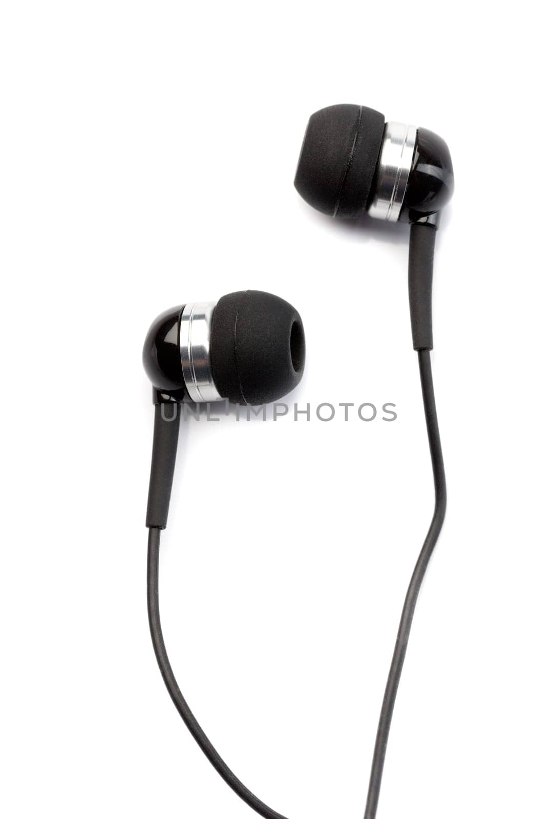 Small in-ear headphones isolated on white background