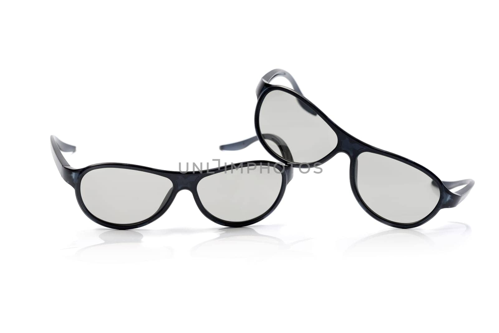 Two pairs of polarized 3D glasses for TV. Izolcht on white.