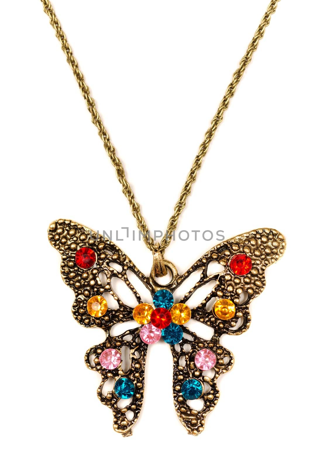 Butterfly pendant decorated with colored stones. Isolated on white.