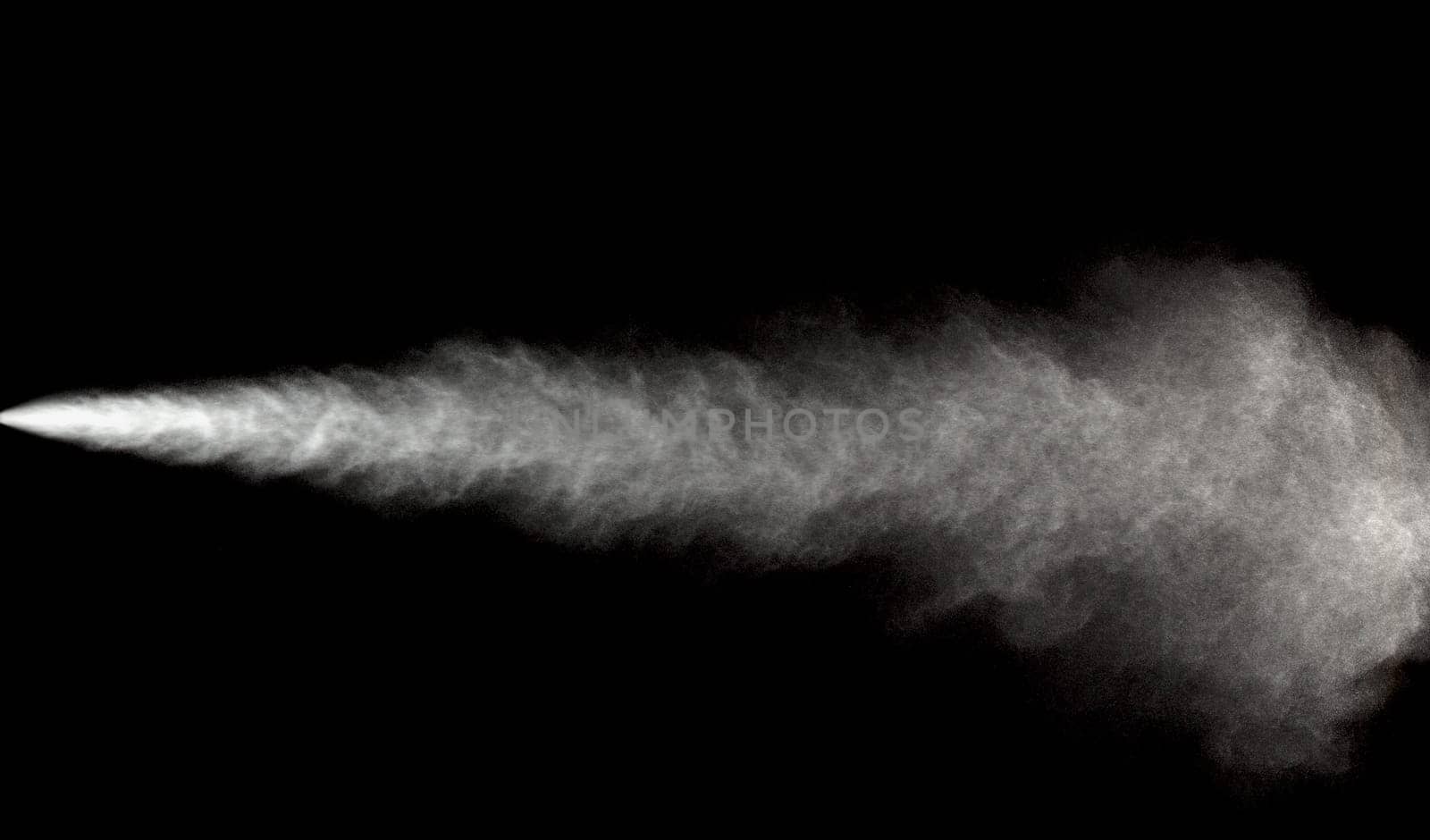 Spraying of water in motion on black background