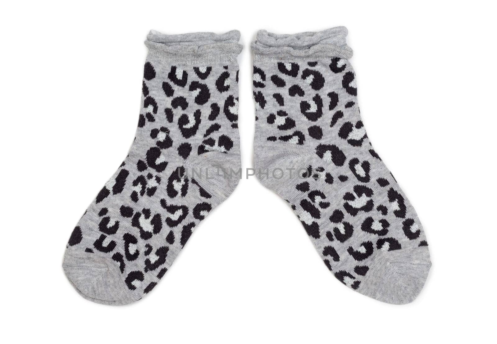 Pair of gray socks with black pattern. Isolate on white.