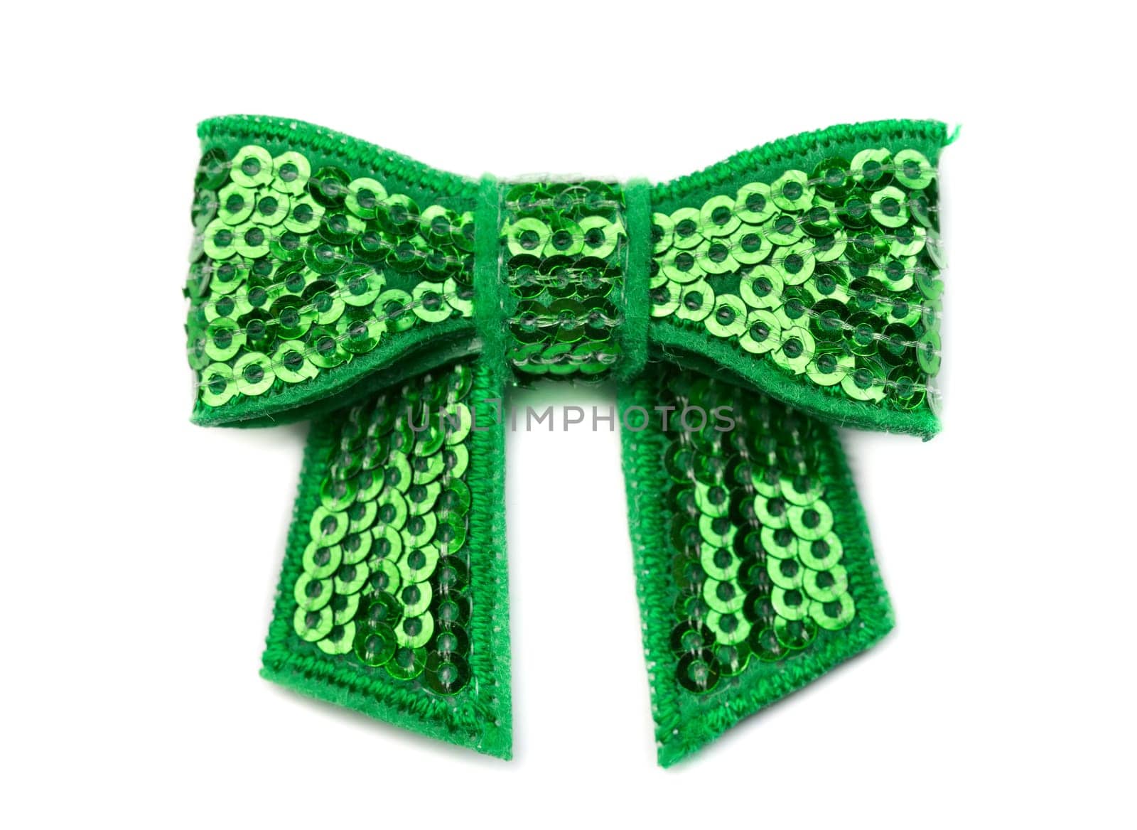 Green bow in rhinestones. Isolate on white background.