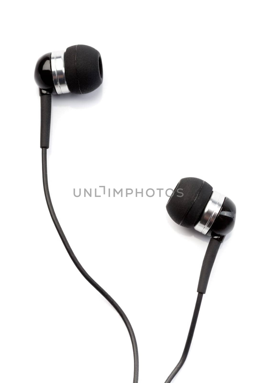 Small in-ear headphones isolated on white