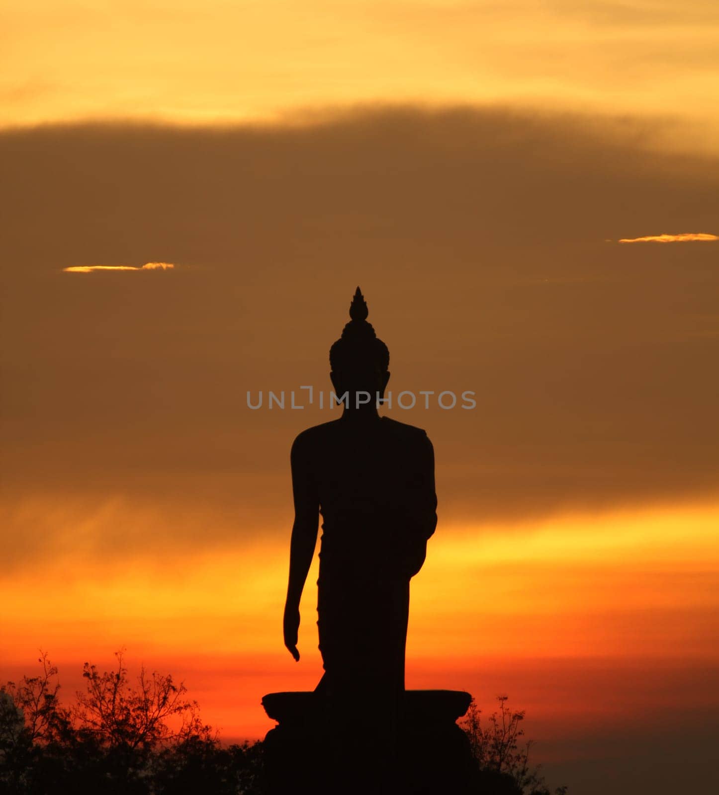 Silhouette of Buddha and the blue sky