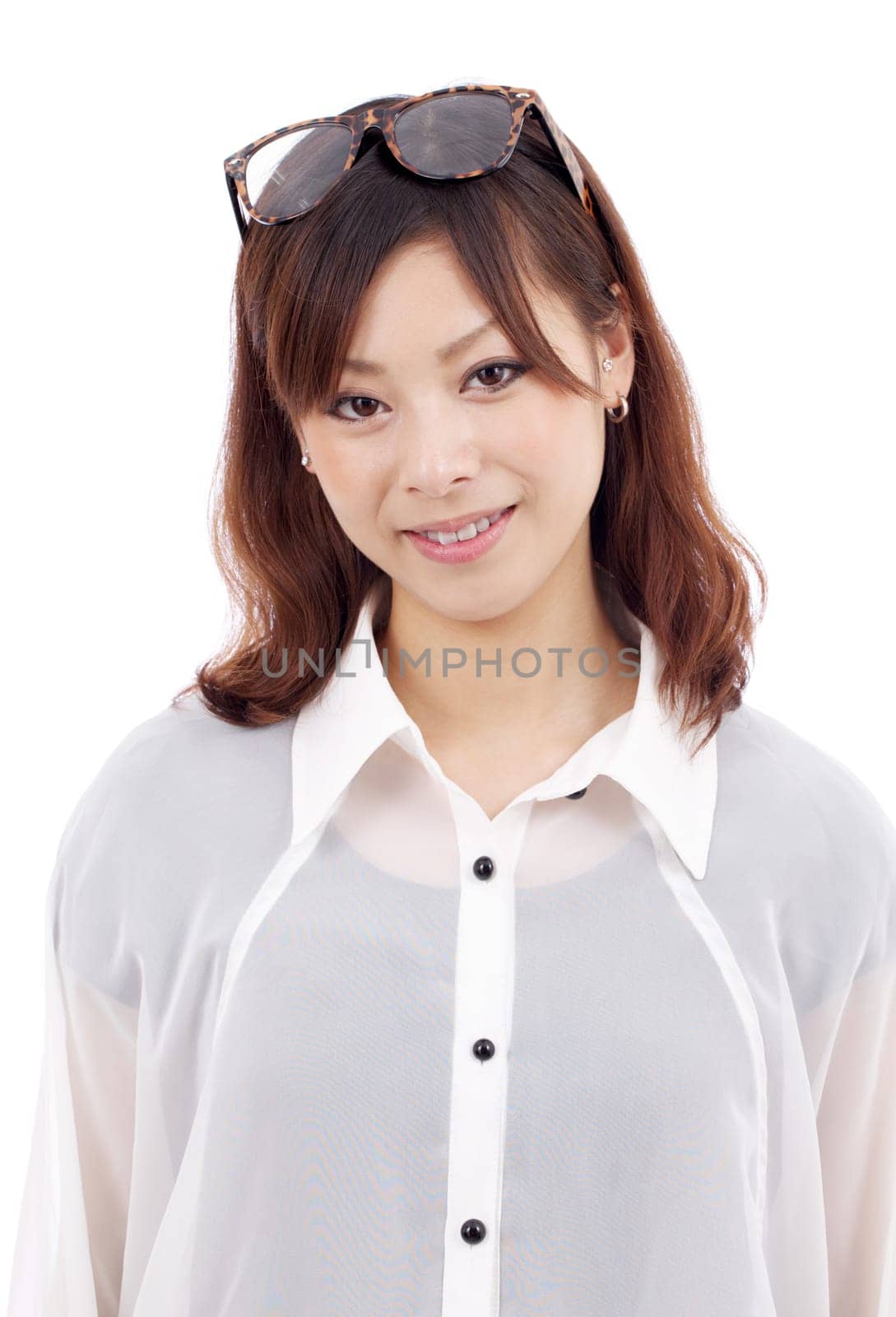 young asian woman with glasses on her head