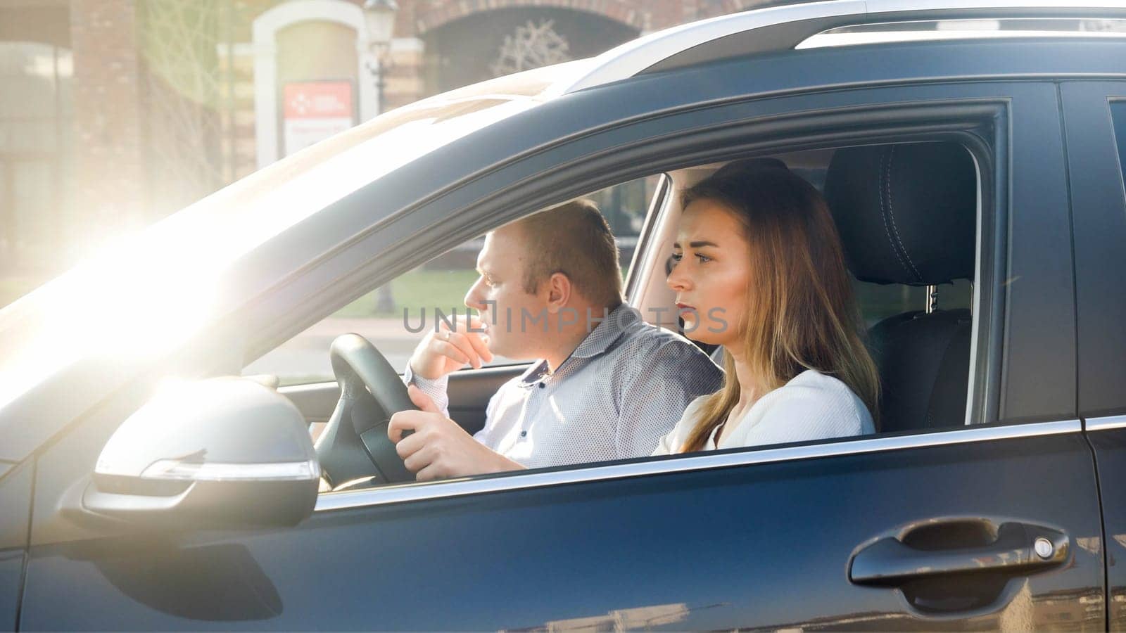 Portrait of family driving a car got lost and looking for the road.