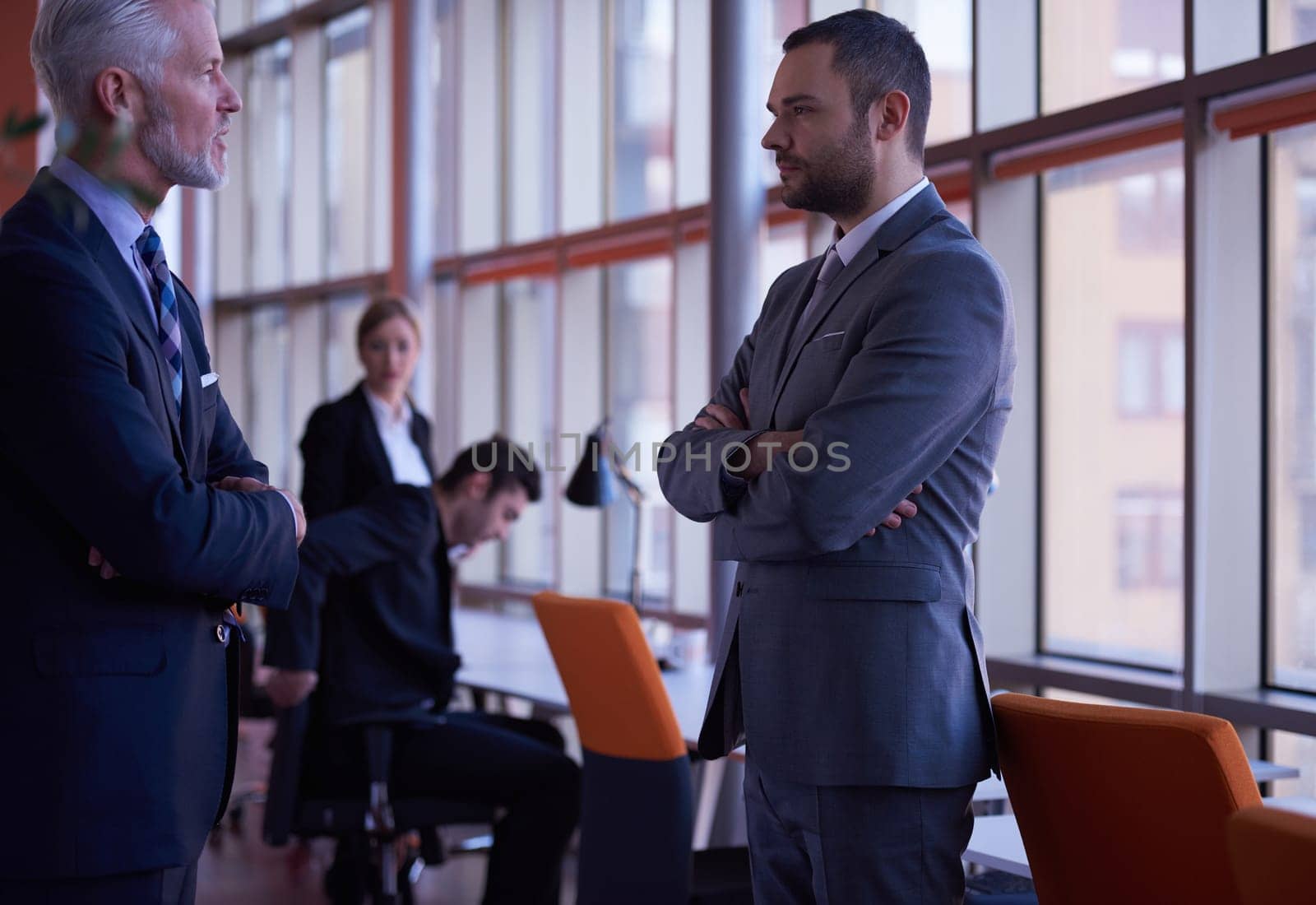 business people group with young adults and senior on meeting at modern bright office interior.