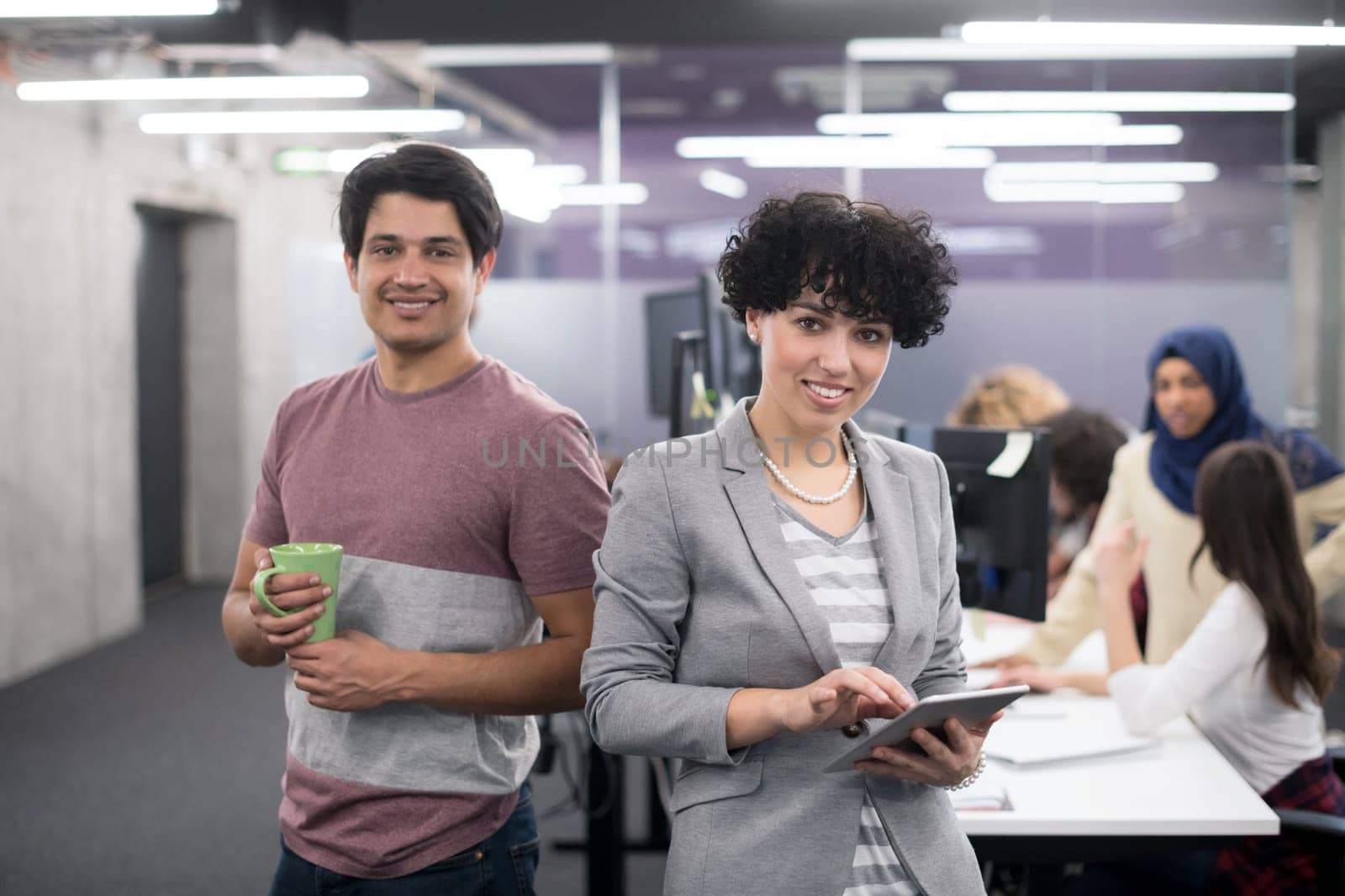 Portrait Of Successful Multiethnic Business team Entrepreneur At Busy startup Office