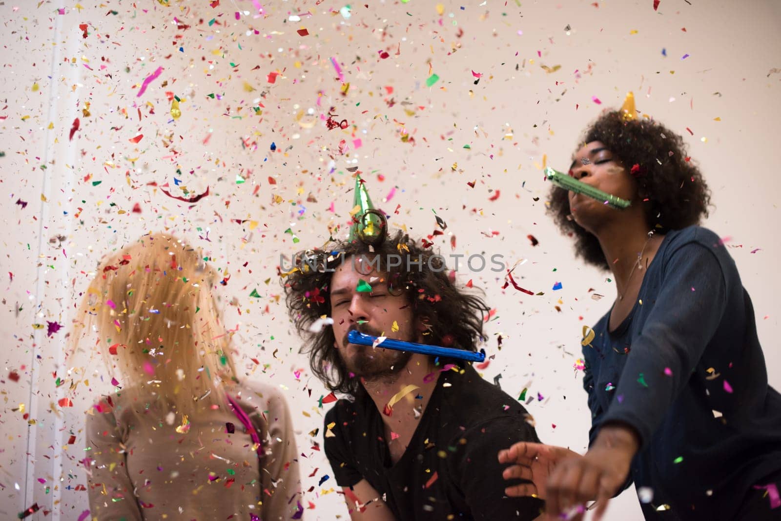 confetti party happy young people group celebrating new year eve while dancing and have fun at home