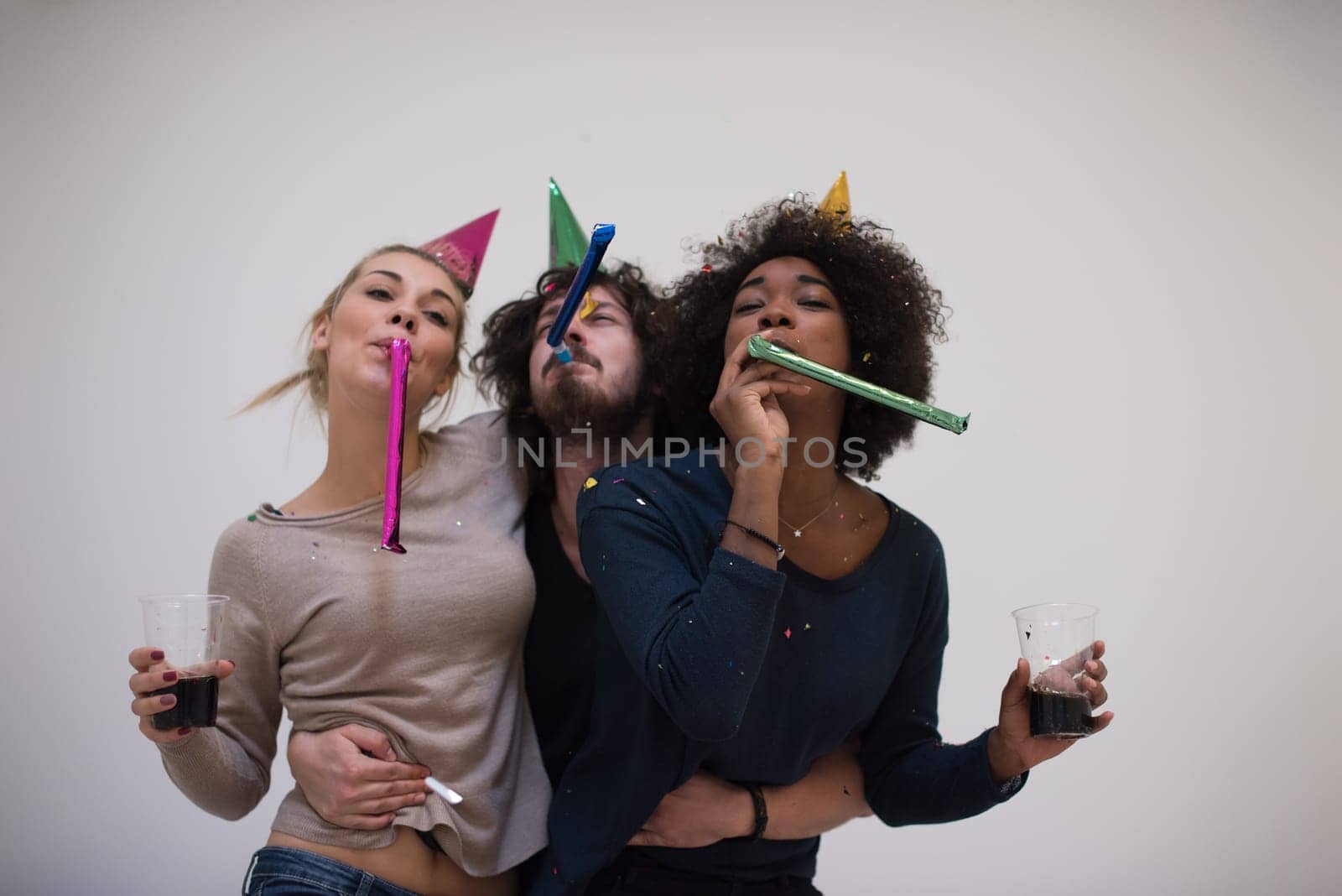 confetti party Multiethnics happy young people group celebrating new year eve while dancing and have fun at home
