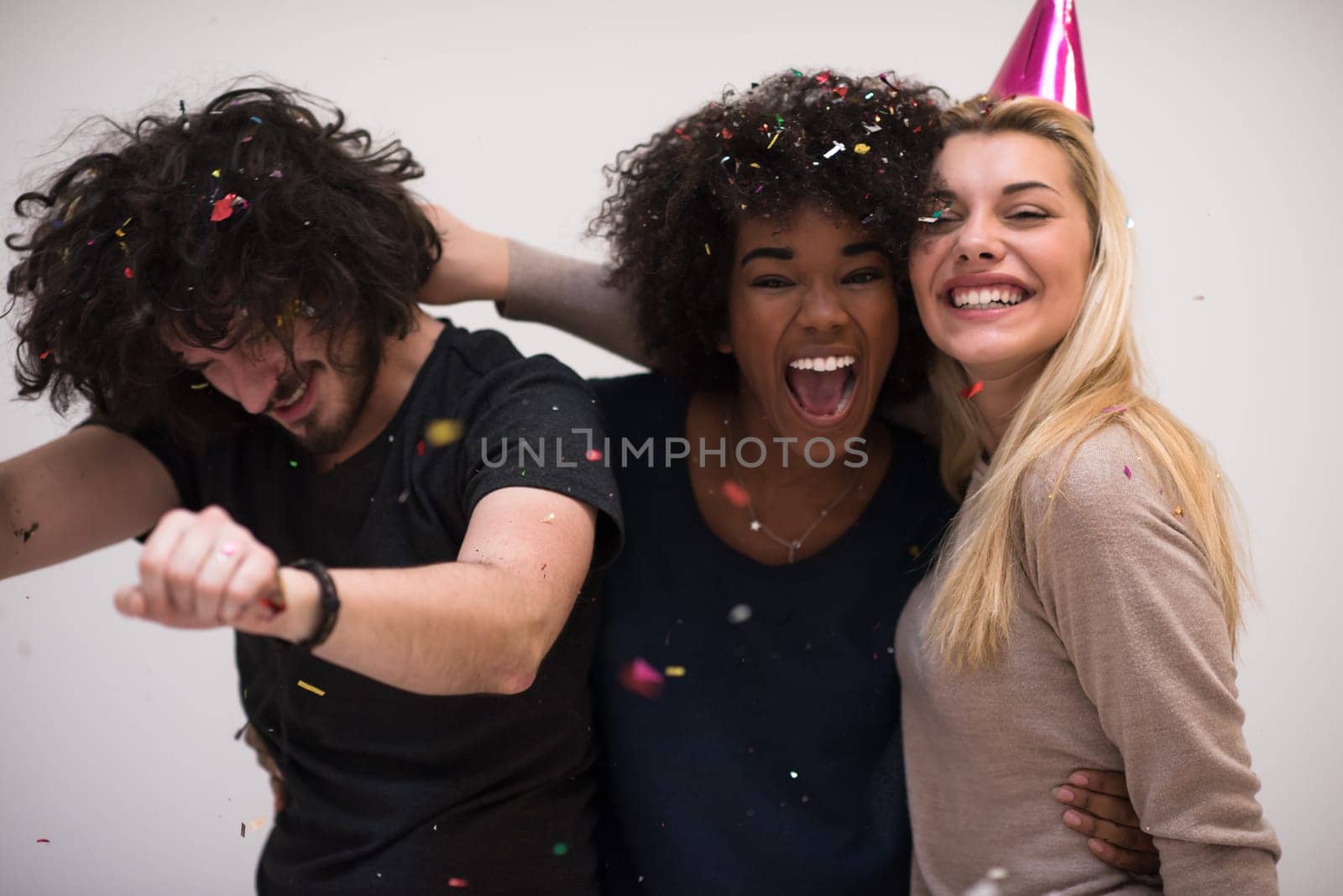 confetti party Multiethnics happy young people group celebrating new year eve while dancing and have fun at home