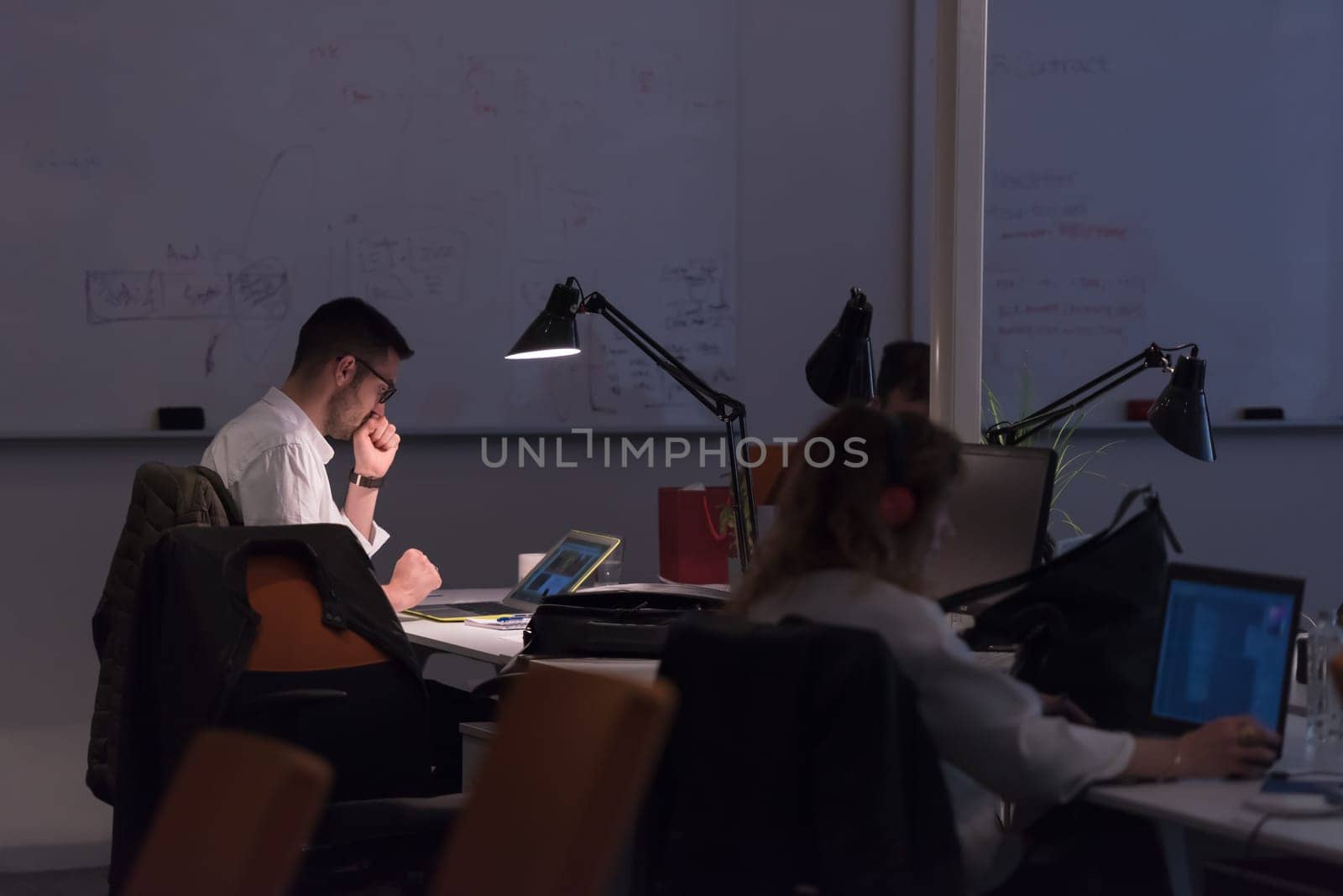 Young Entrepreneur Freelancer Working Using A Laptop In Coworking space
