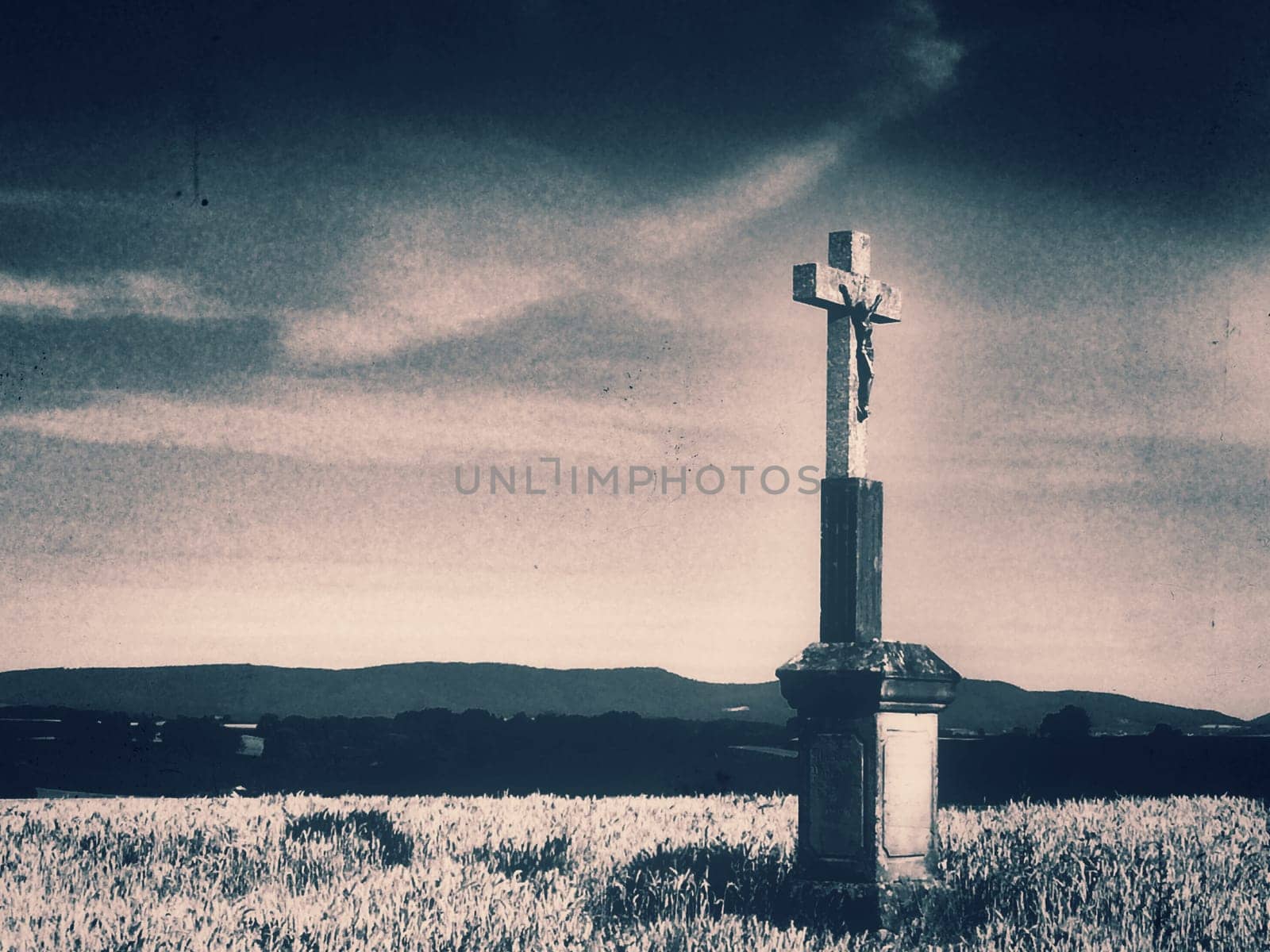 Cross in cornfield in retro style