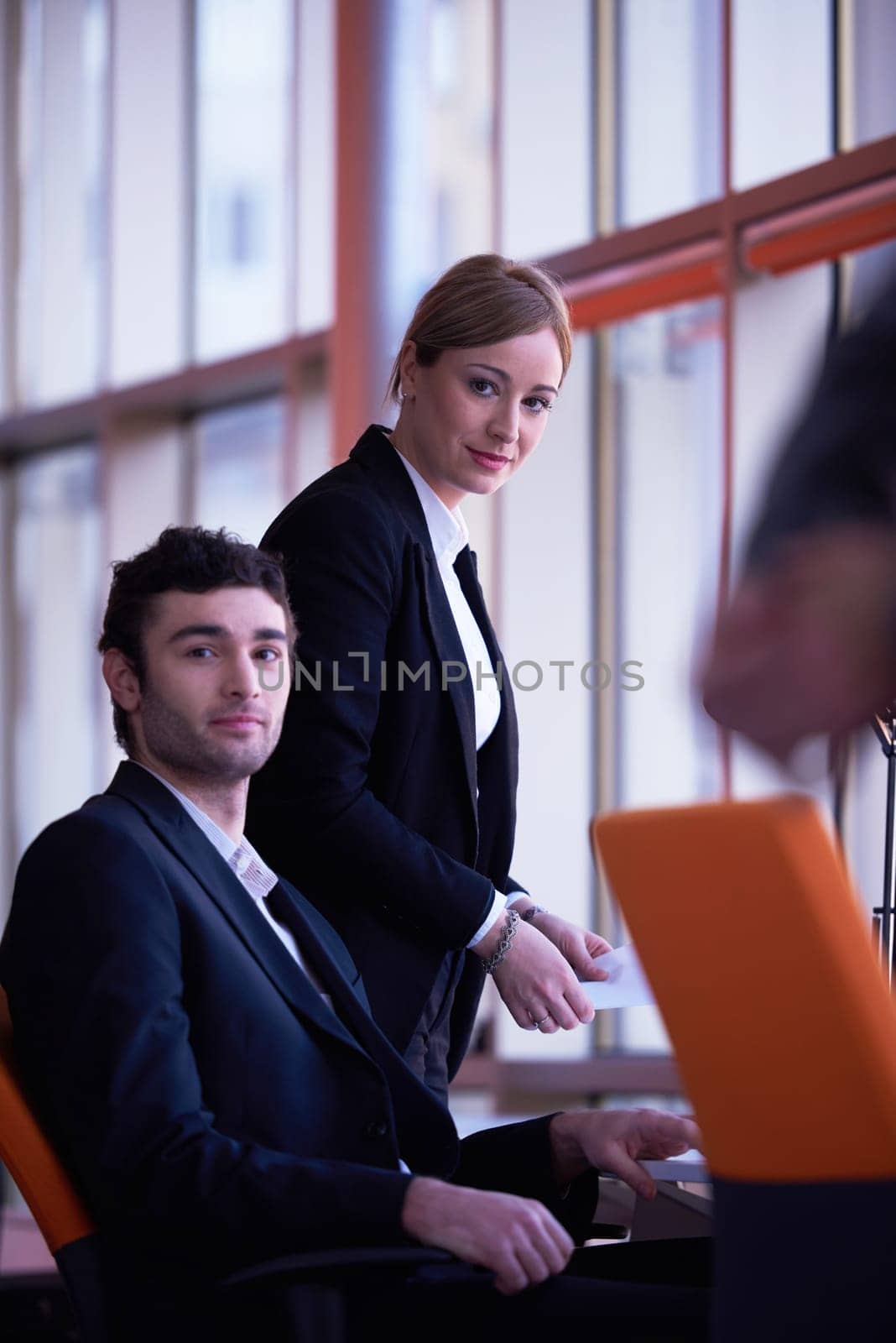business people group with young adults and senior on meeting at modern bright office interior.