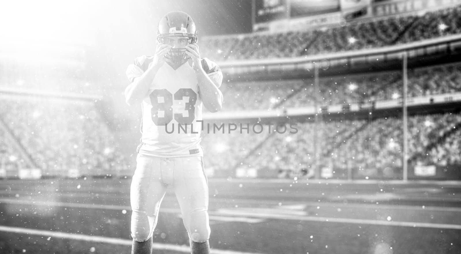 American Football Player isolated on big modern stadium field with lights and flares