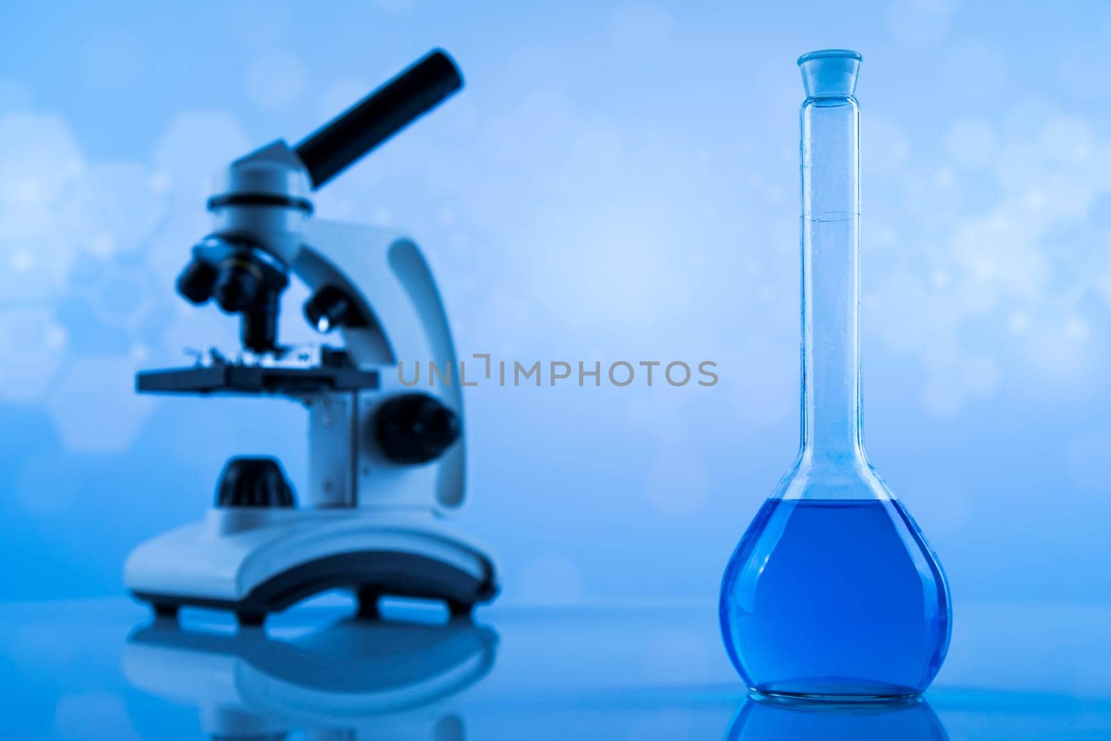 Microscope, Glassware, Laboratory beakers,Science experiment