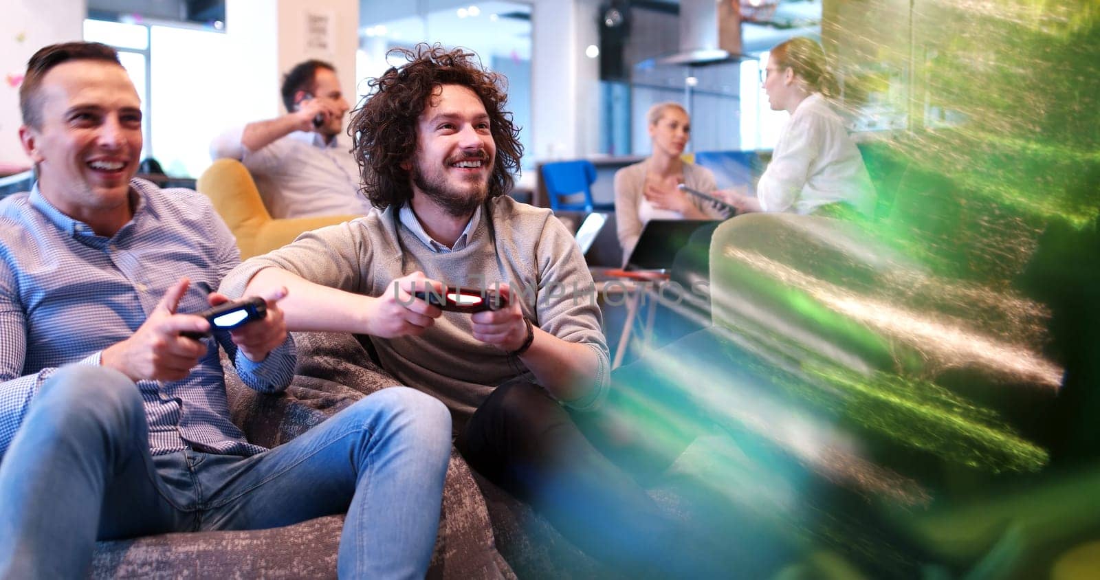 Work hard play hard. Office Workers Playing computer games