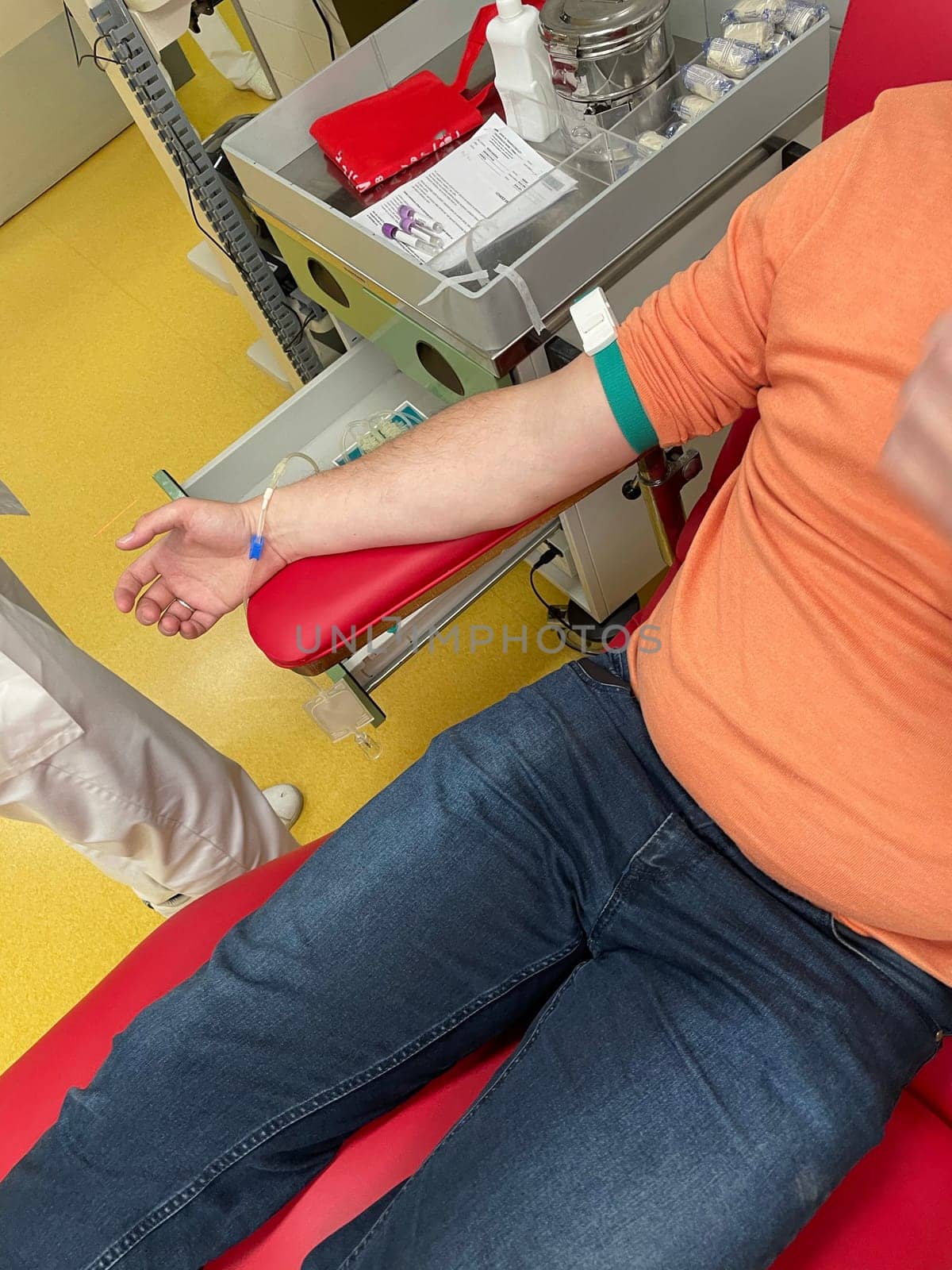 Close up nurse hand collecting blood sample for diagnosis covid-19, Coronavirus.Laboratory technician taking blood for blood chemistry diagnosis by automatic machine. High quality photo