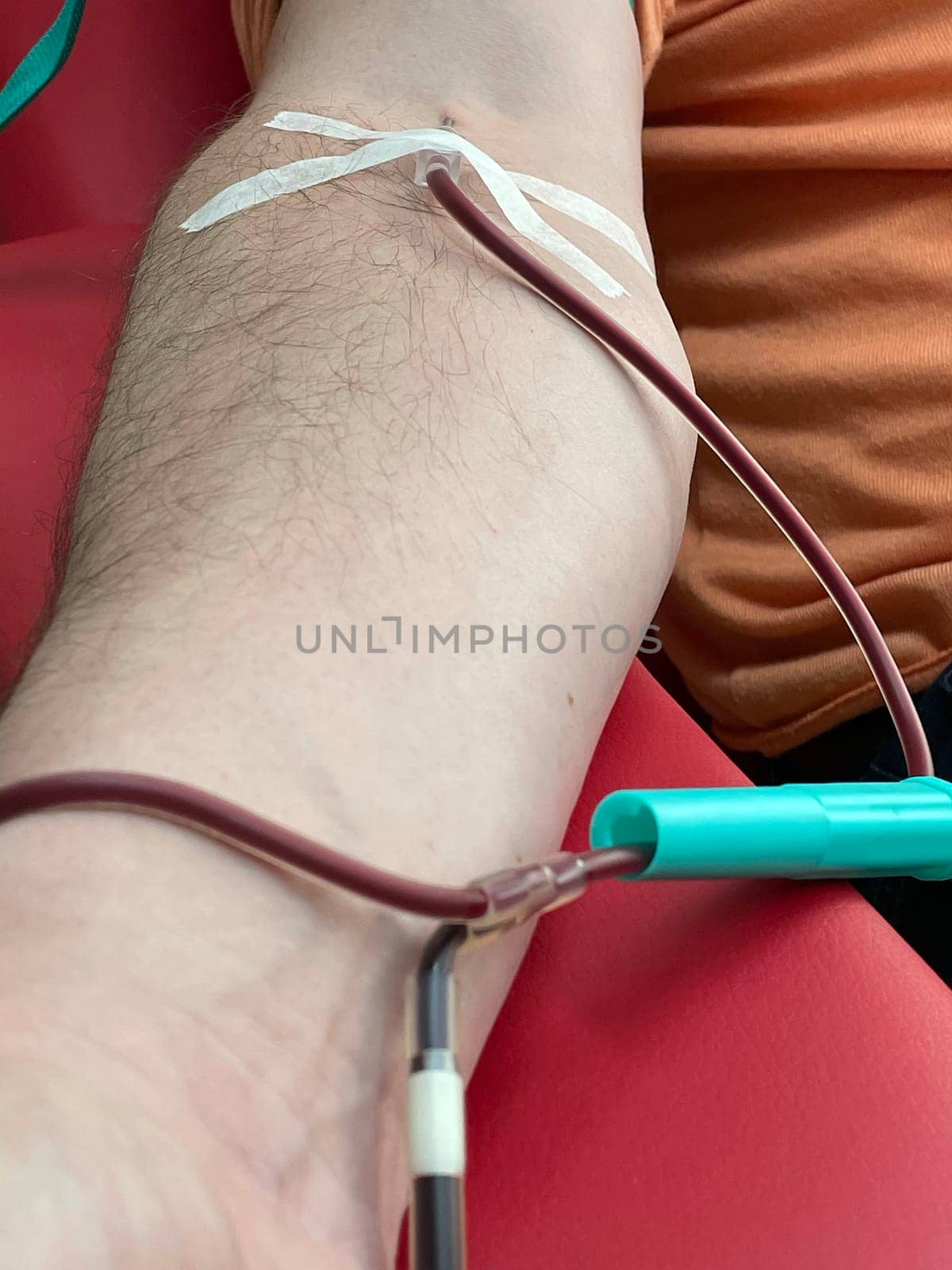 Close up nurse hand collecting blood sample for diagnosis covid-19, Coronavirus.Laboratory technician taking blood for blood chemistry diagnosis by automatic machine. High quality photo