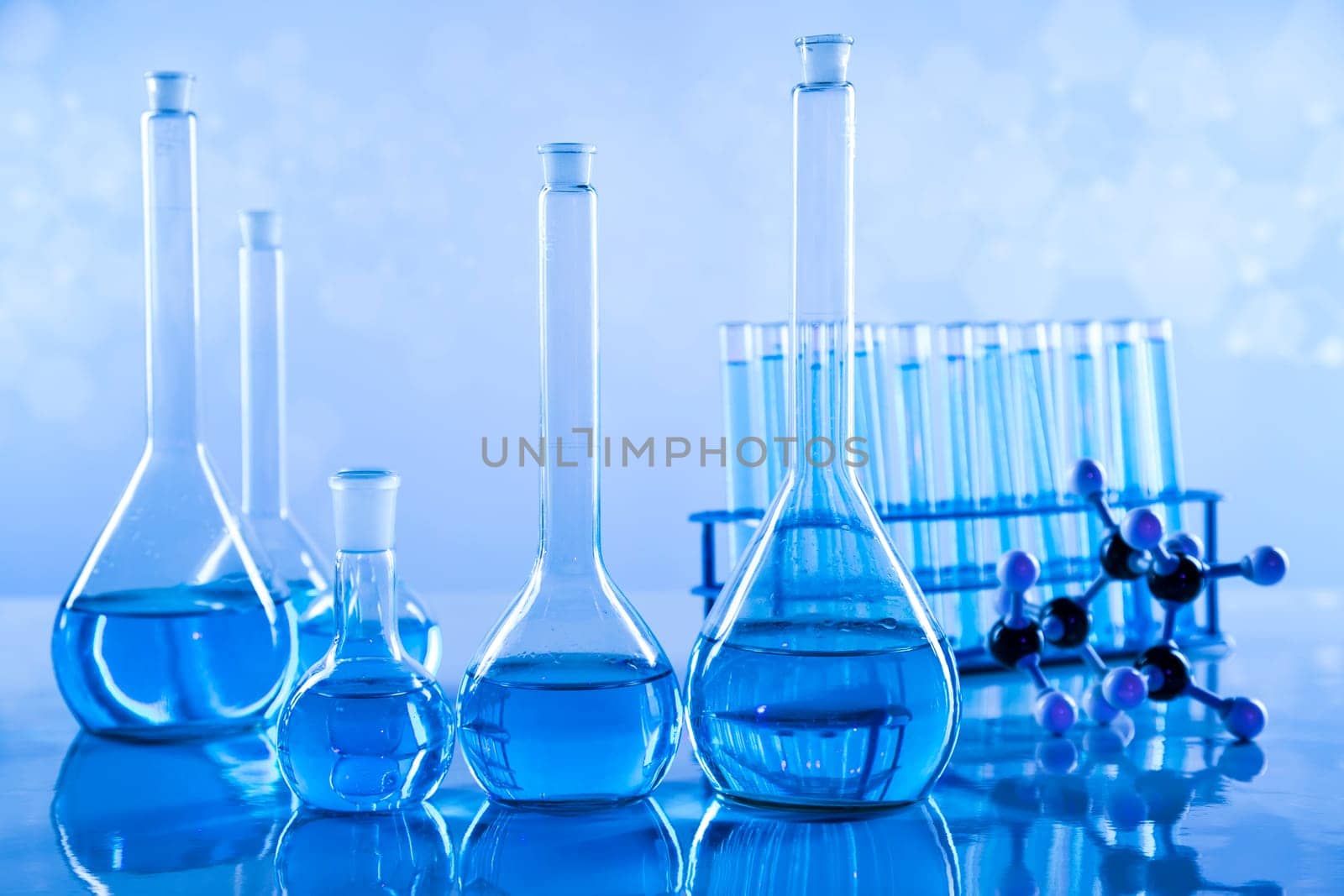Laboratory beakers,Science experiment, blue background
