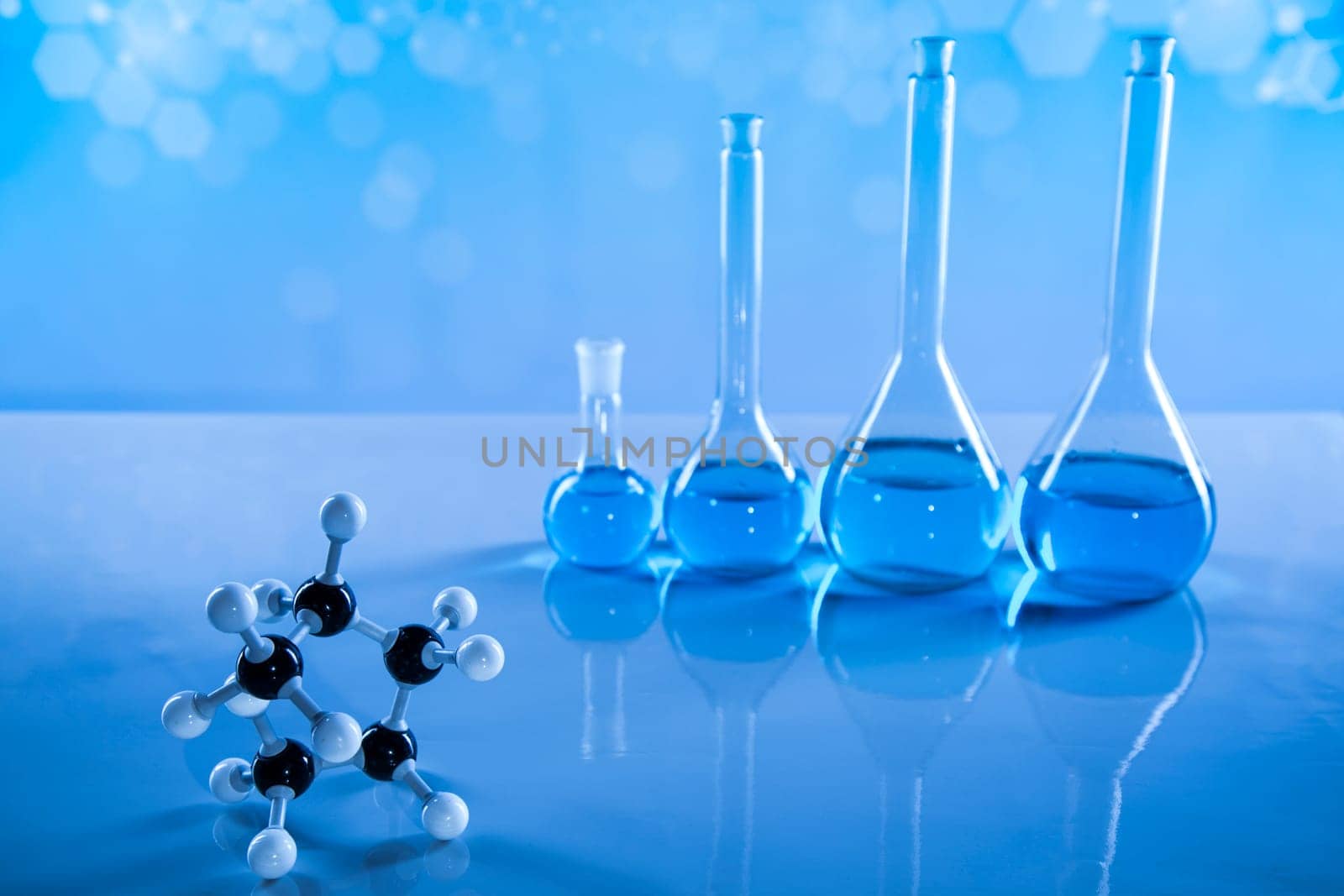 Laboratory beakers,Science experiment, blue background
