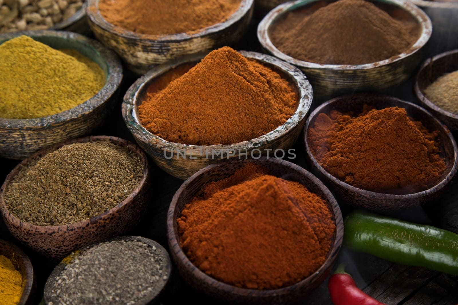 Assorted Spices and wooden bowl of smoke