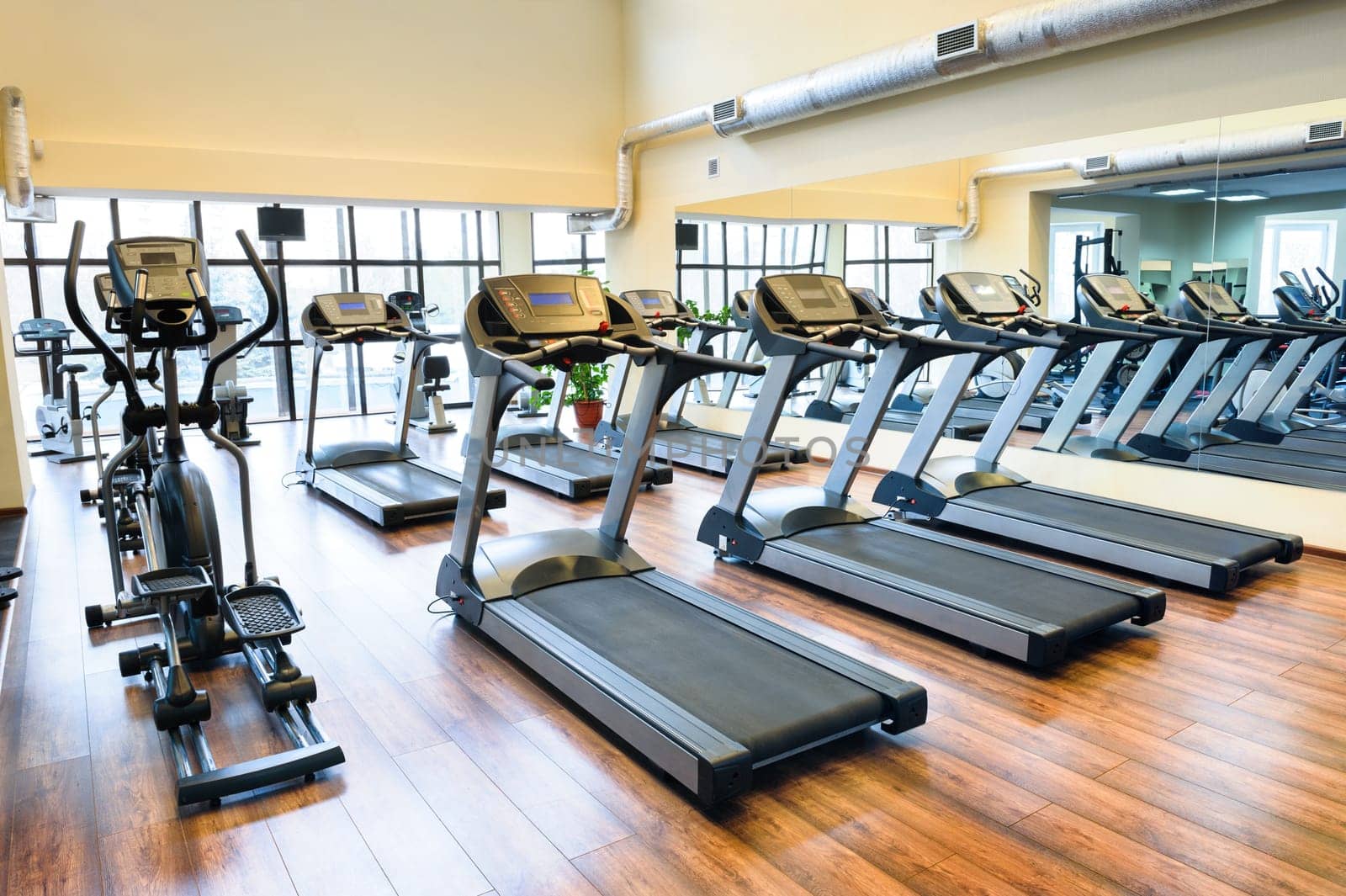 Set of treadmills staying in line in the gym