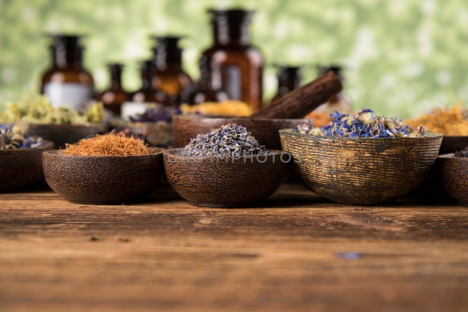 Herbs medicine and vintage wooden background