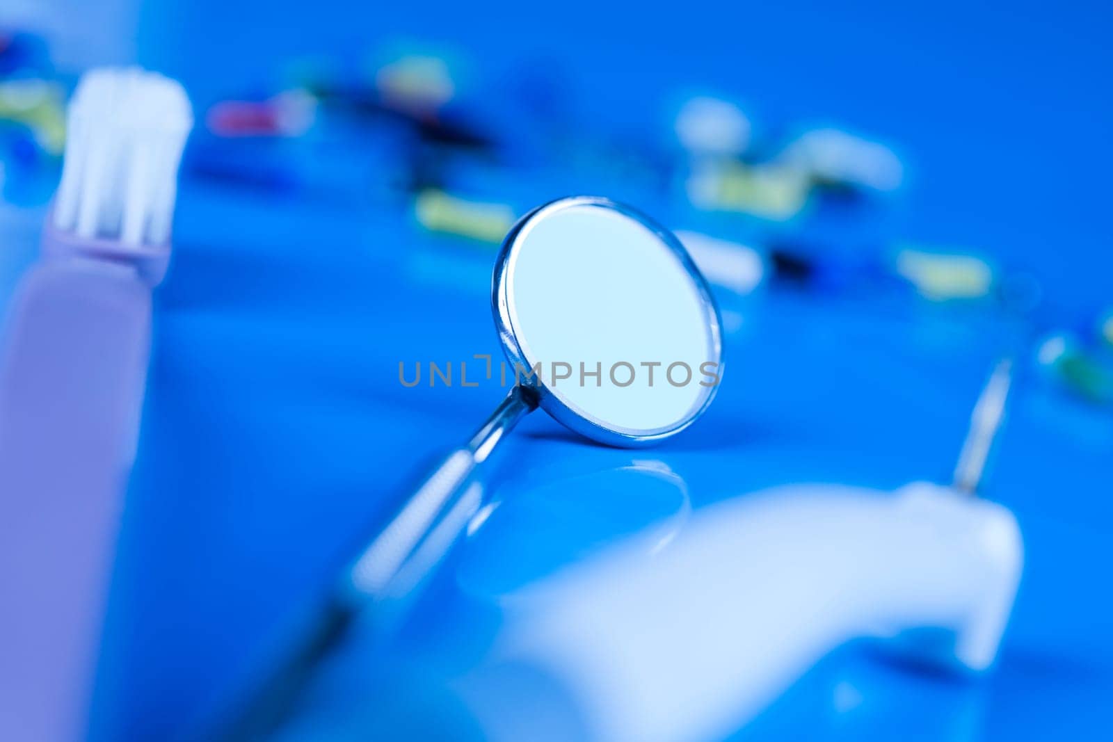Dentist equipment on blue background