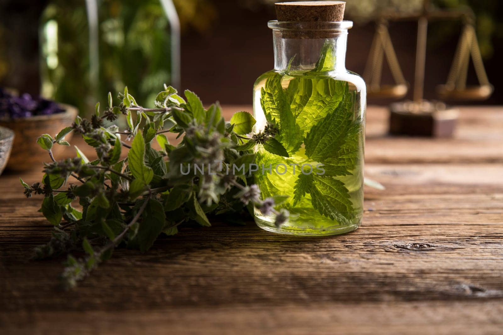 Oil and Natural medicine, wooden table background