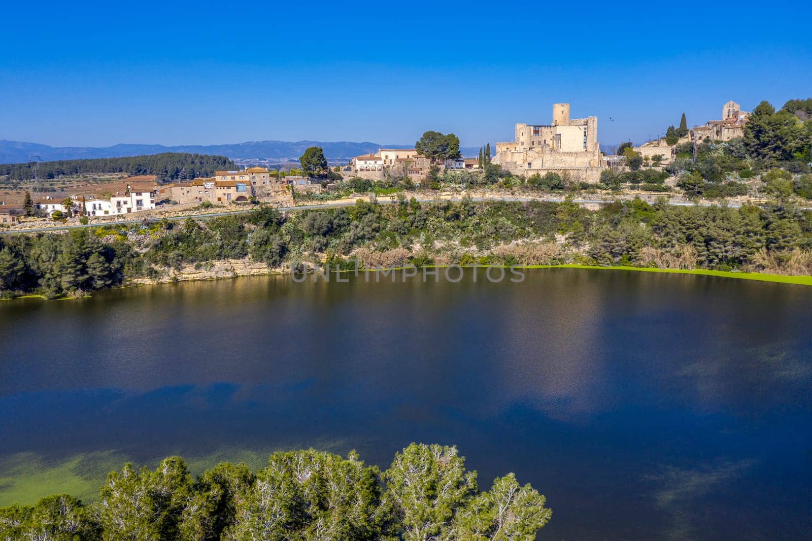Aerial view of the foix swamp, Castle and Church of Sant Pedro, in Castellet Catalonia Spain