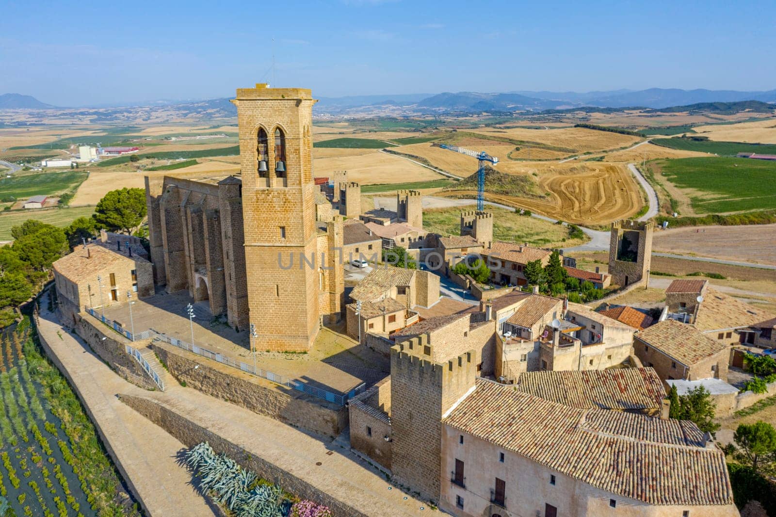 View of Artajona city with san Pedro church from fortress, Navarra Spain