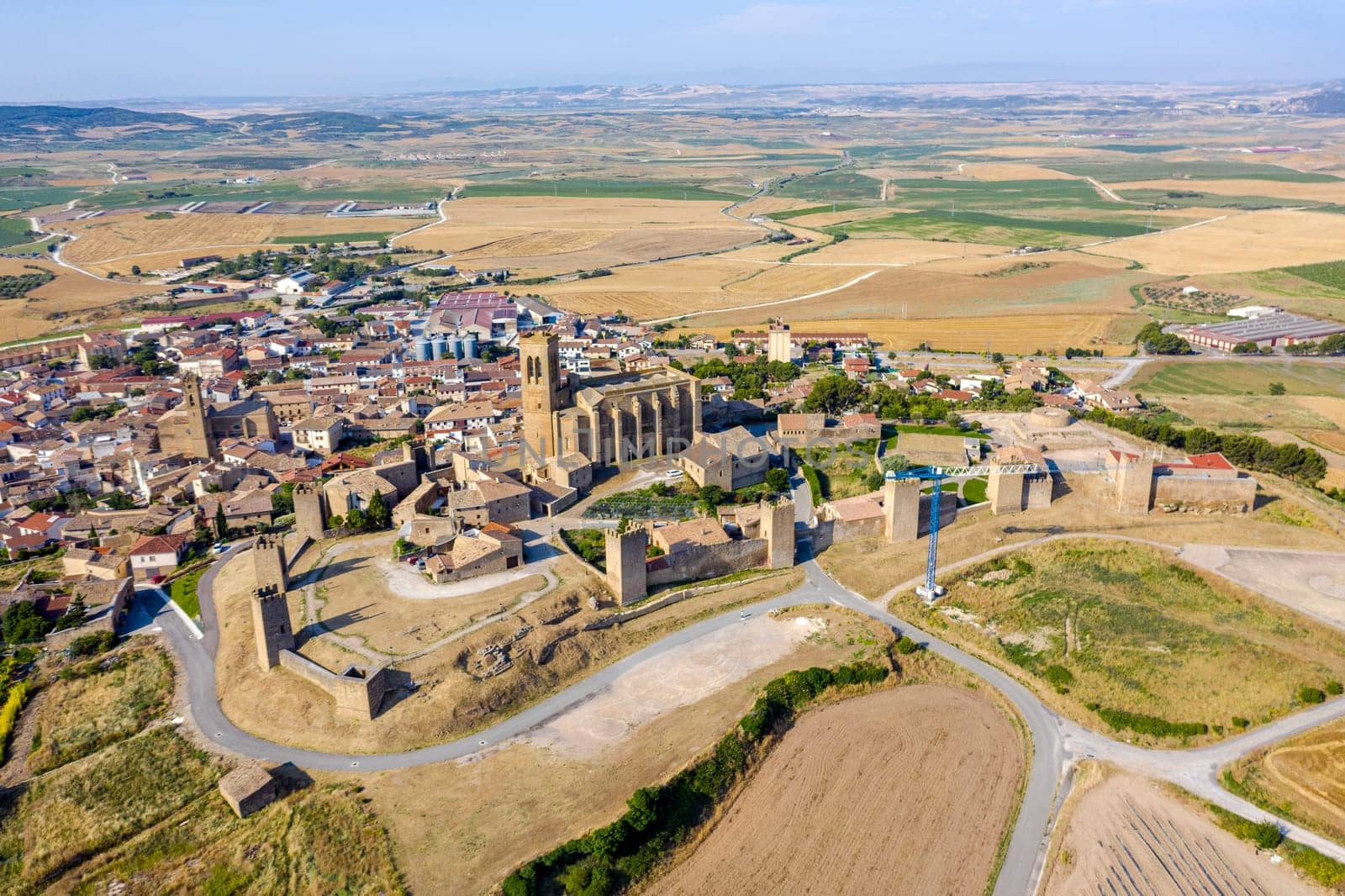 View of Artajona city with san Pedro church from fortress, Navarra Spain