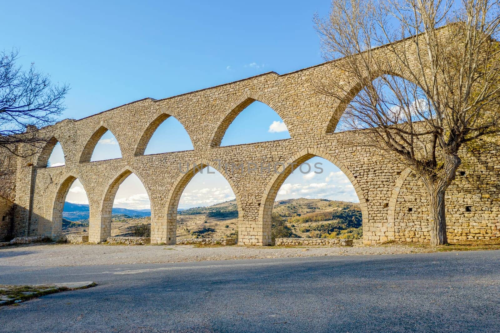 Morella aqueduct in Castellon Maestrazgo at Spain blue sky