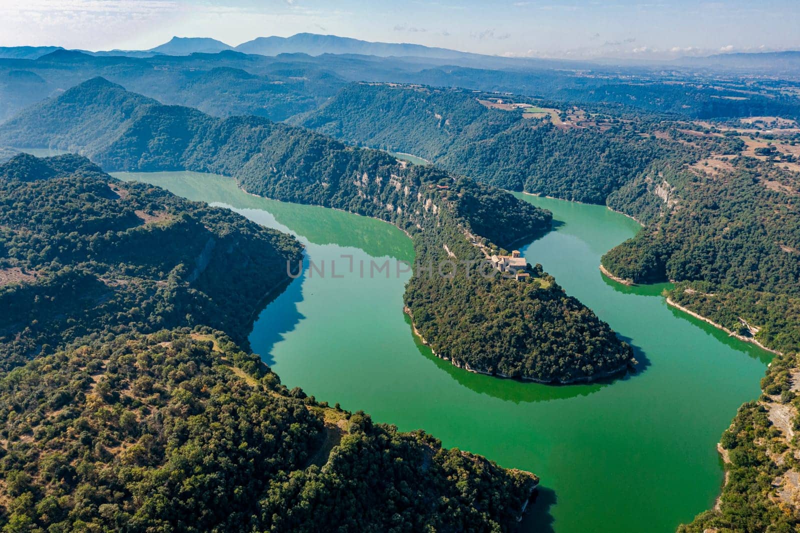 Aerial view of a Benedictine monastery of Sant Pere de Casserres on the Ter river.