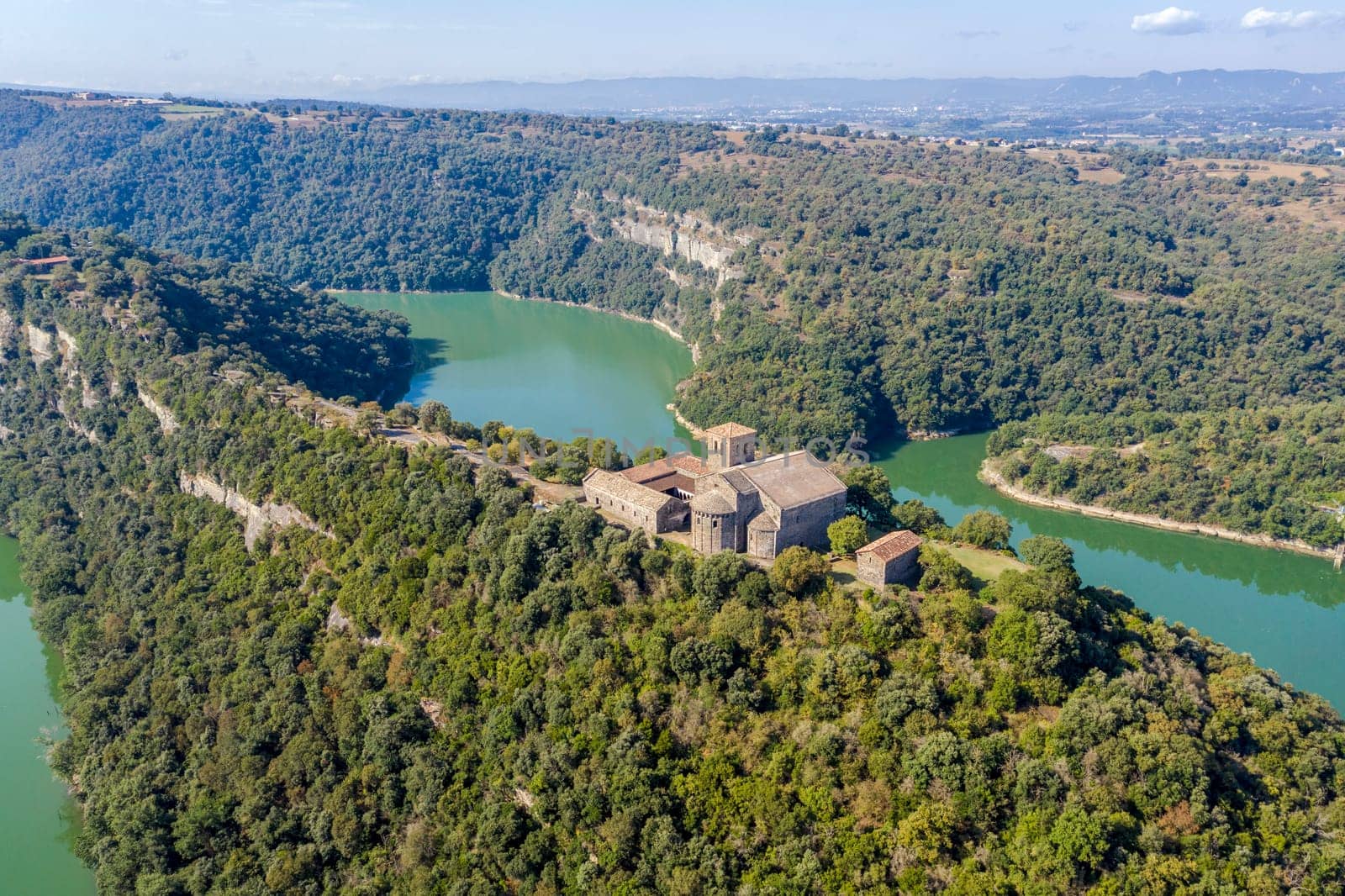 Aerial view of a Benedictine monastery of Sant Pere de Casserres on the Ter river.