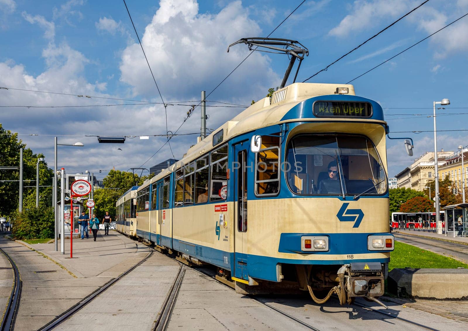 Vienna, Austria - September 16, 2019: people in streetcar in the Hofburg - with history dating back to mid-19th century. It is located in centre of Vienna