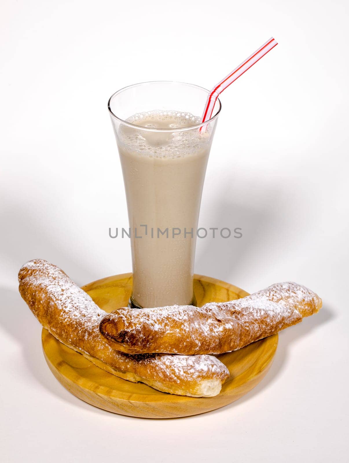 Horchata is a drink, made with the juice of tigernuts and sugar. Native from Valencia ? Spain, it is a refreshing drink, often accompanied with long thin buns called fartons.
