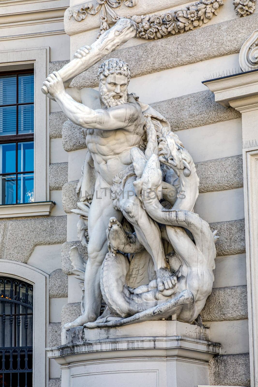 Statue of Hercules and dragon at the gate of the Michaelertrakt, wing of the Imperial palace