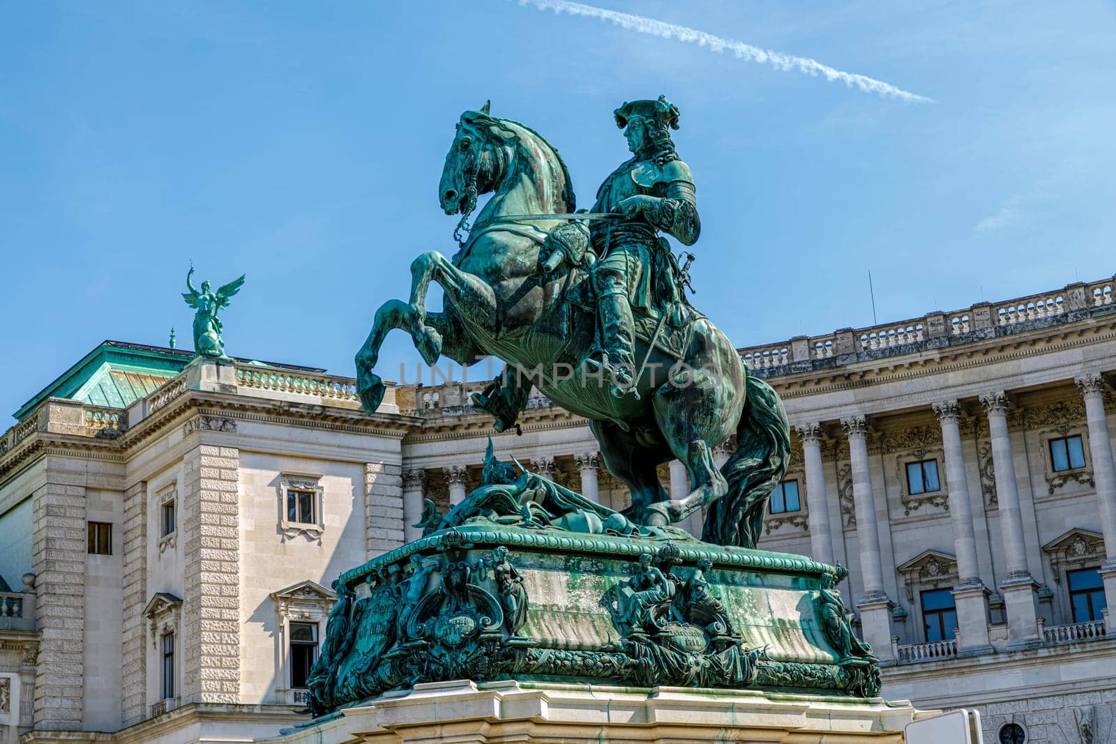Vienna, Austria - September 16, 2019: Statue of Kaiser Joseph II (1741-1790) in the Josefplatz in Vienna, Austria the building behind the emperor houses the National Library of the imperial Hofburg.