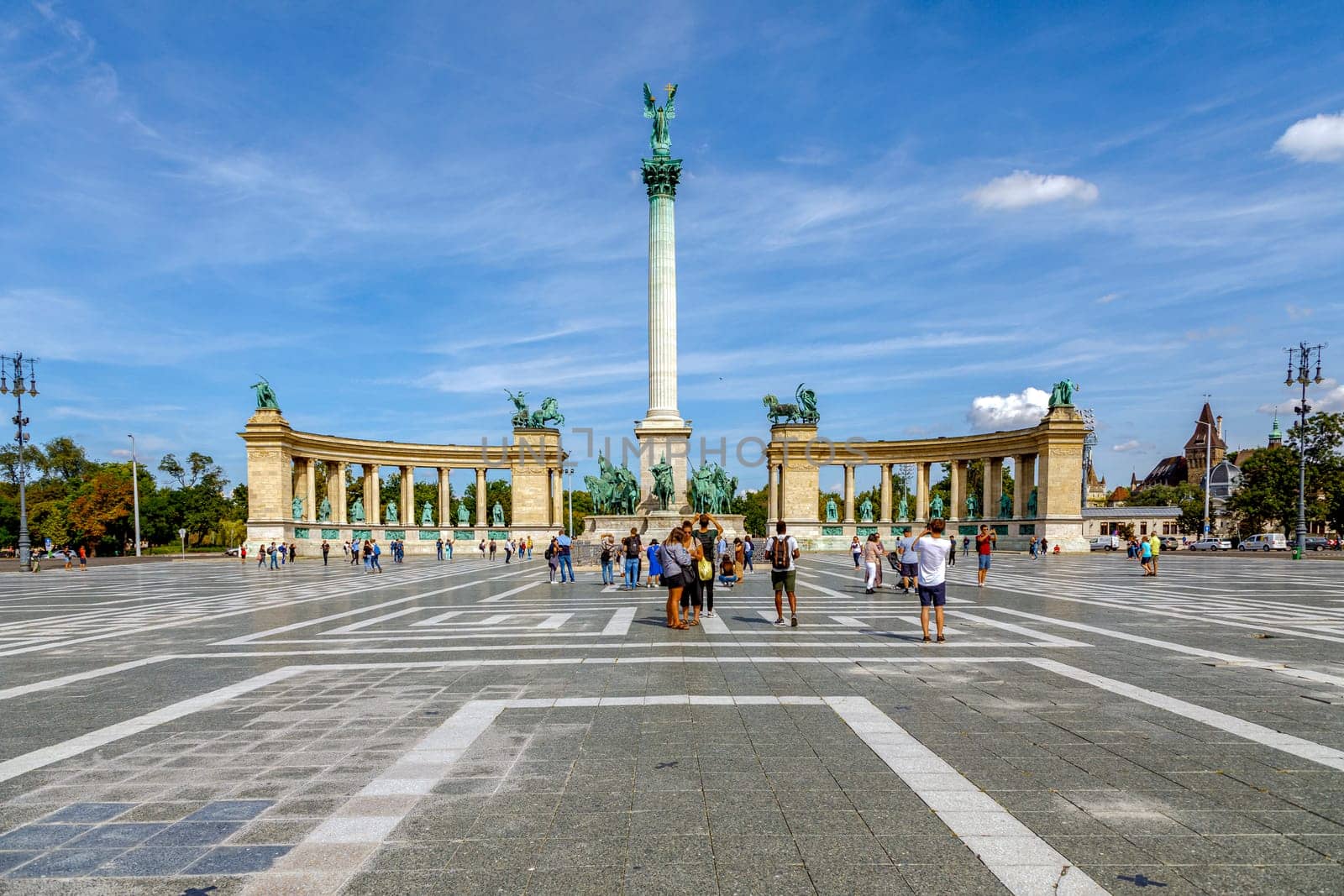 Budapest, Hungary - November 15, 2019: Many tourists stroll on the Heroes Square. Is one of the most-visited attractions in Budapest squares in Budapest, Hungary.
