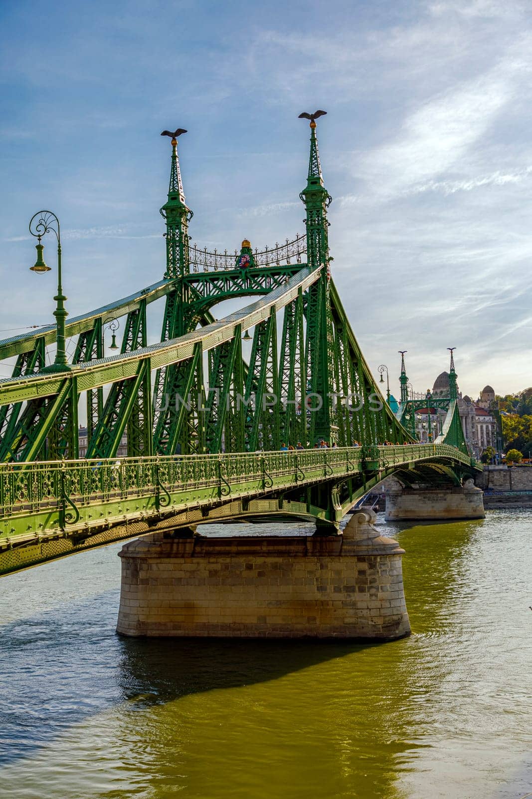 Budapest, Hungary - November 15, 2019: The Liberty Bridge in Budapest in Hungary, it connects Buda and Pest cities across the Danube river. shortest bridge in Budapest city.