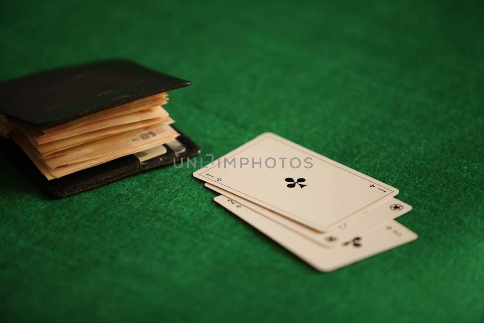 Ace cross and wallet with cash money gambling concept