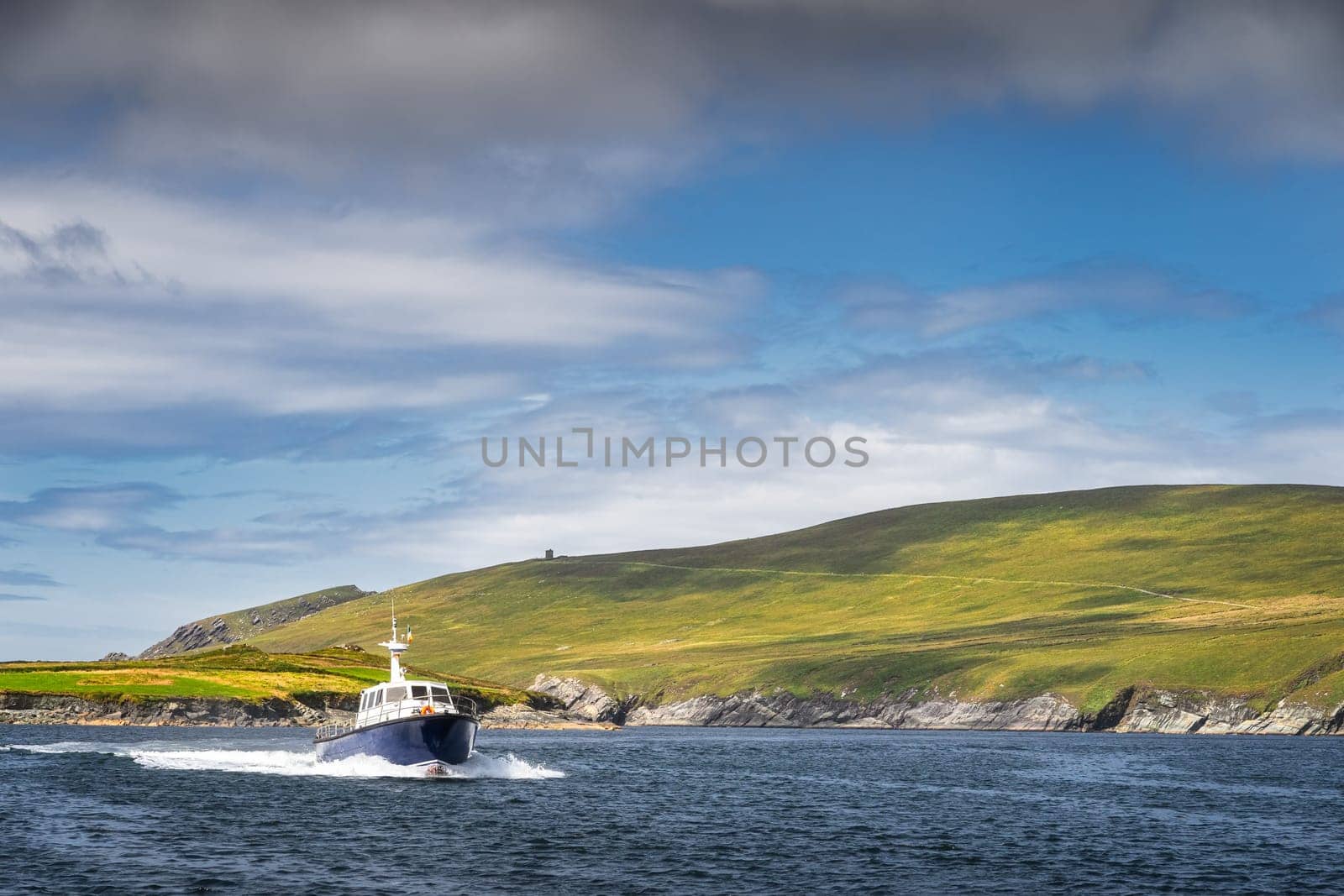 Tourists sailing on a motorboat to visit Skellig Michael island where the Star Wars were filmed, Ring of Kerry, Portmagee, Wild Atlantic Way, Ireland