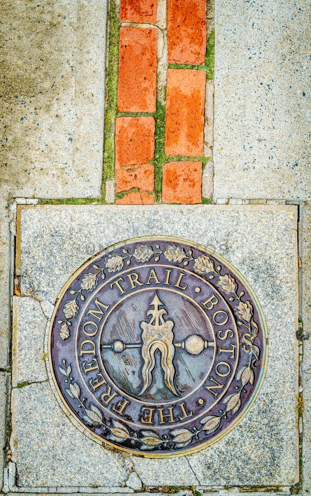 Boston, MA, September 28, 2020: Plaque marking the beginning of the Freedom trail at the Bunker Hill Monument