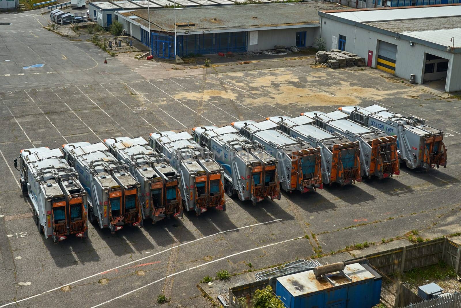 Nine refuse collection lorries are parked in the derelict port of Ramsgate.