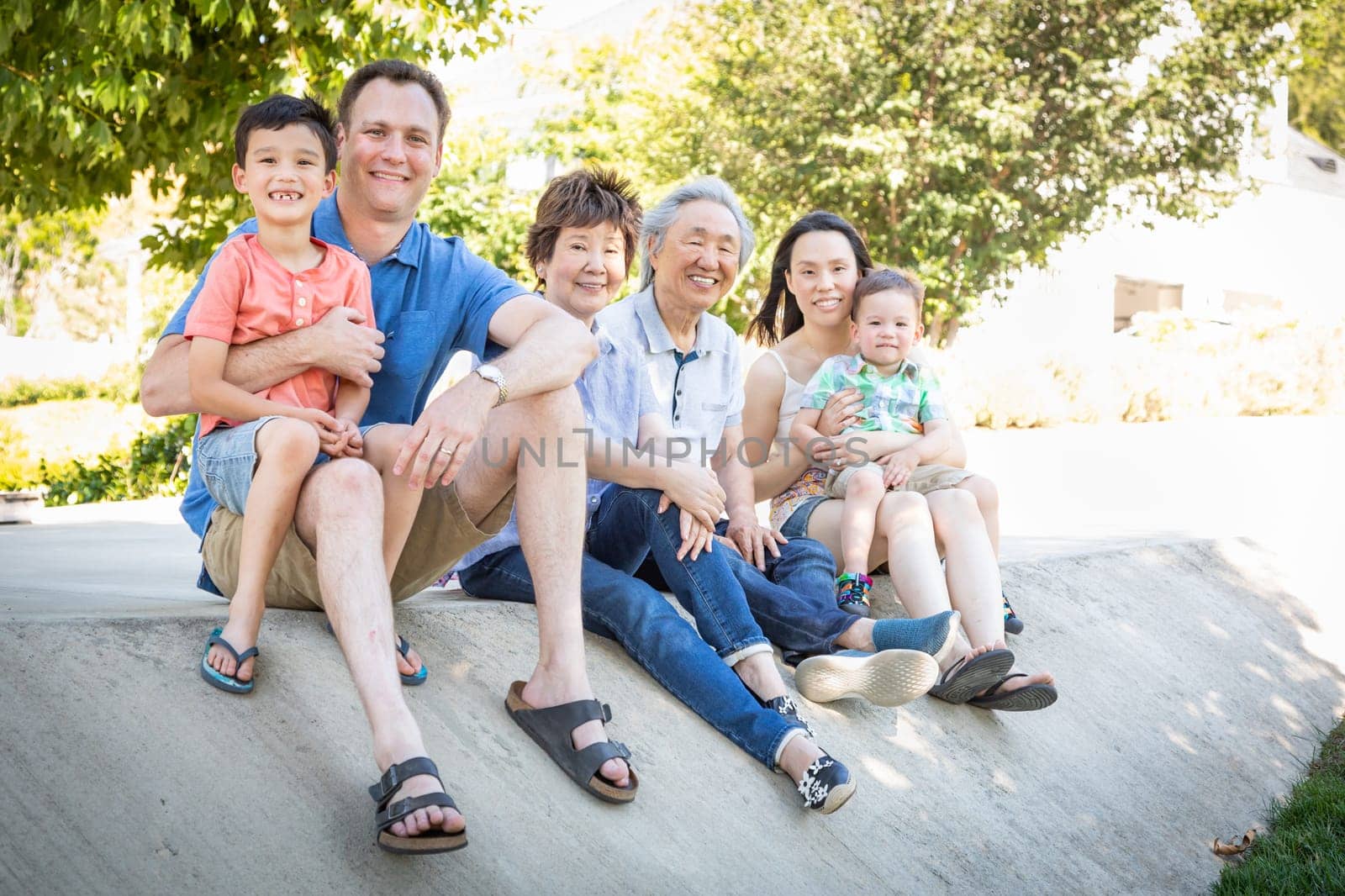 Chinese Grandparents, Mother, Caucasian Father and Mixed Race Children Portrait.