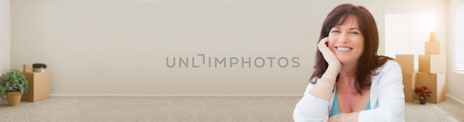 Banner of Middle Aged Woman Relaxing Inside Empty Room With Moving Boxes.