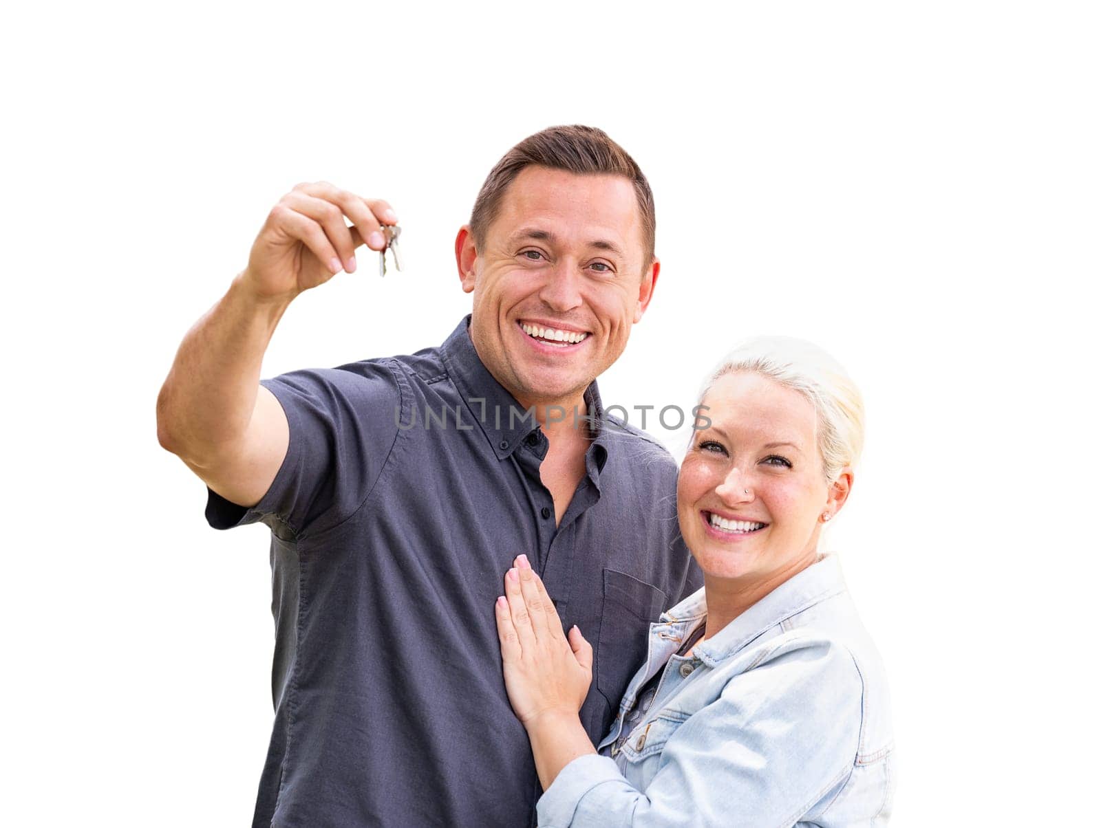 Young Adult Couple Holding New House Keys Isolated On A White Background